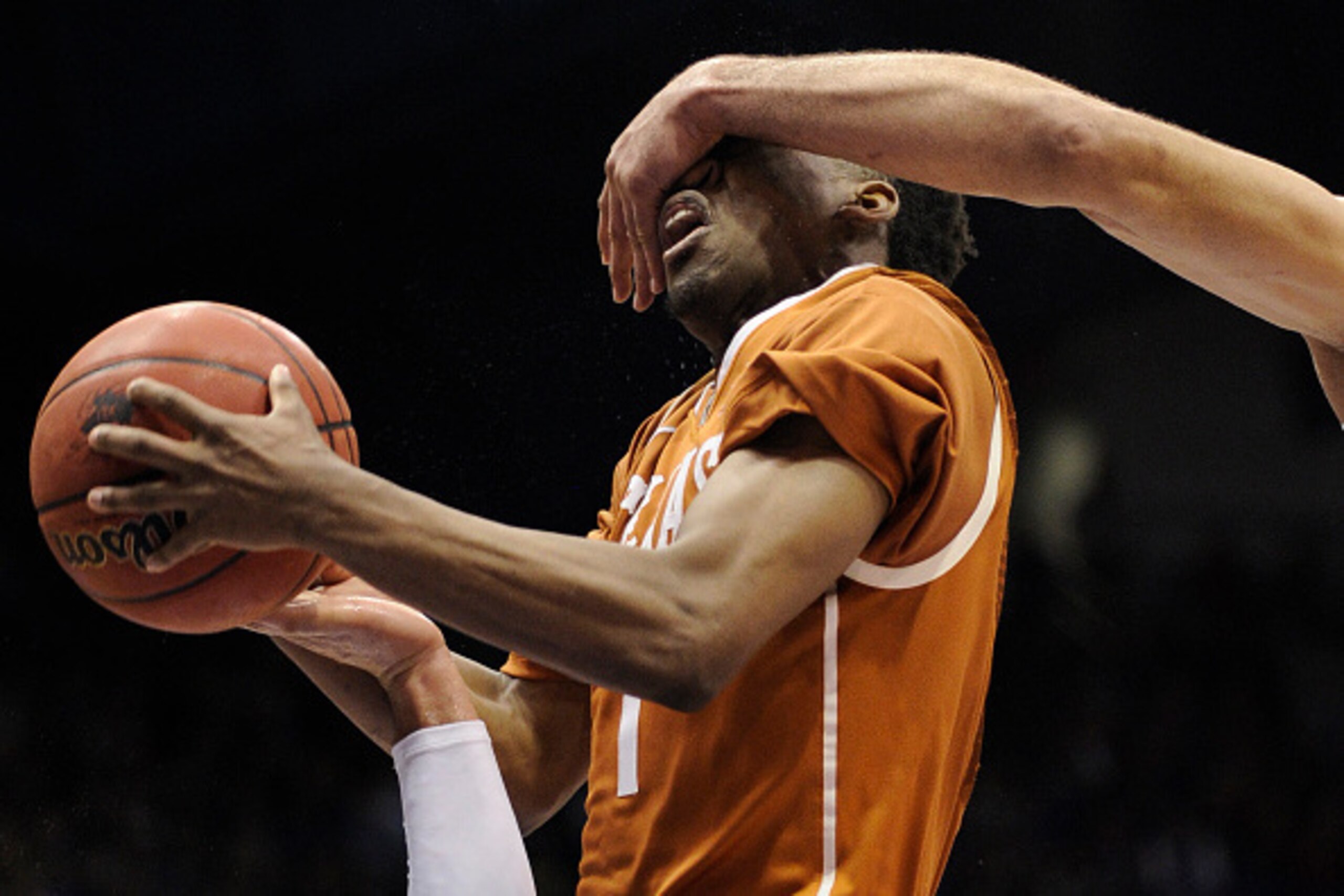 LAWRENCE, KS - FEBRUARY 28:  Isaiah Taylor #1 of the Texas Longhorns goes up for a shot but us fouled during a game against the Kansas Jayhawks in the second half at Allen Fieldhouse on February 28, 2015 in Lawrence, Kansas. Kansas won 69-64. (Photo by Ed