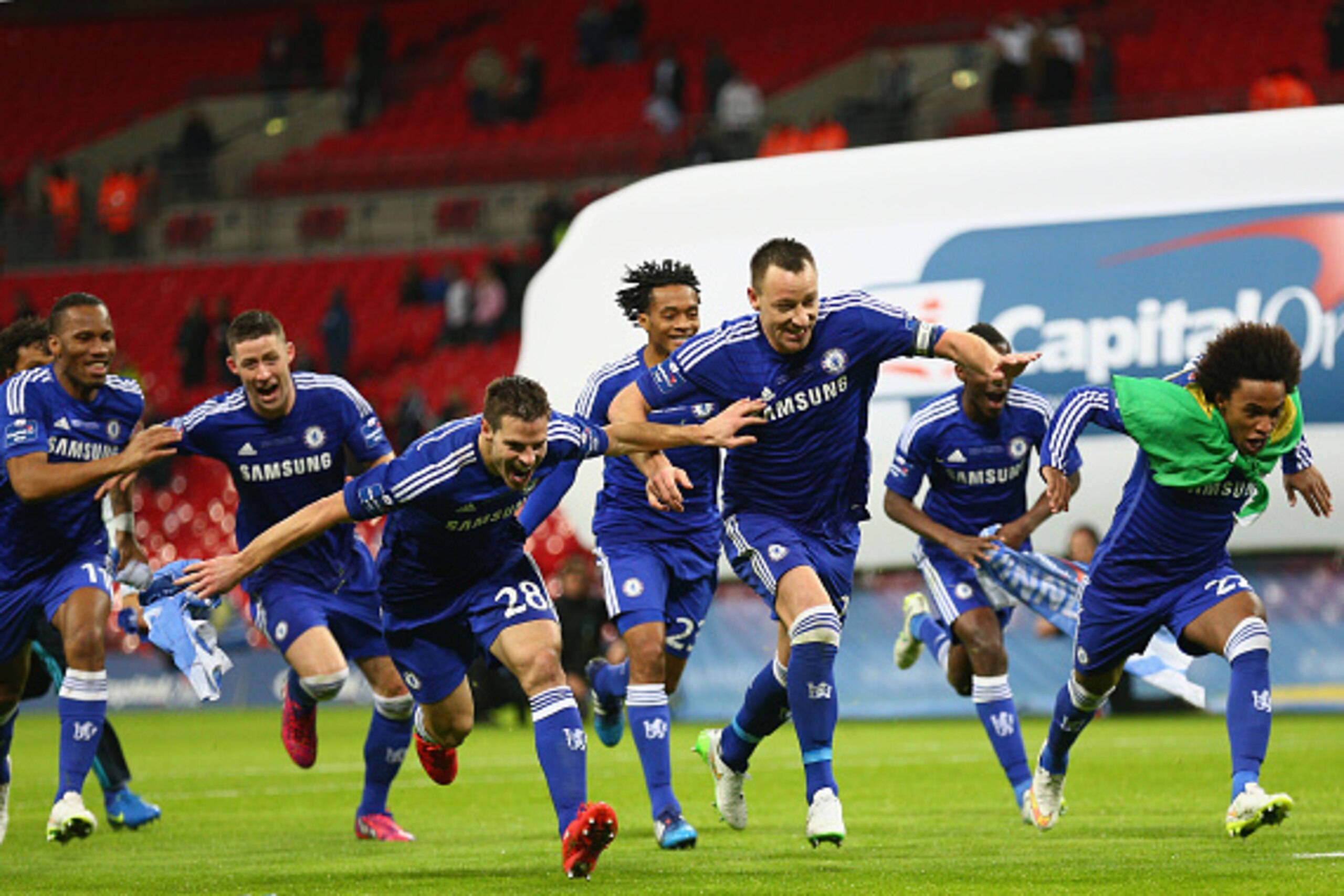 LONDON, ENGLAND - MARCH 01:  (L-R) Cesar Azpilicueta, John Terry and Willian of Chelsea celebrate winning  the Capital One Cup Final match between Chelsea and Tottenham Hotspur at Wembley Stadium on March 1, 2015 in London, England.  (Photo by Clive Mason