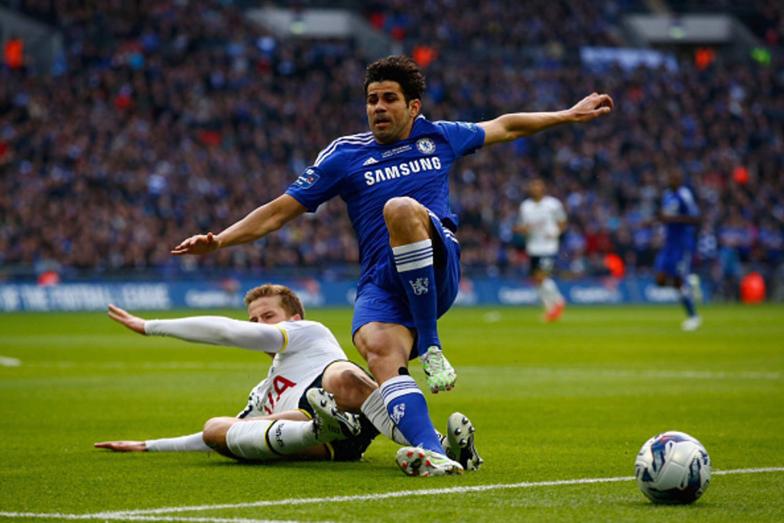 LONDON, ENGLAND - MARCH 01: Eric Dier of Spurs slides in to tackle Diego Costa of Chelsea during the Capital One Cup Final match between Chelsea and Tottenham Hotspur at Wembley Stadium on March 1, 2015 in London, England. (Photo by Clive Rose/Getty Ima LONDON, ENGLAND - MARCH 01: Eric Dier of Spurs slides in to tackle Diego Costa of Chelsea during the Capital One Cup Final match between Chelsea and Tottenham Hotspur at Wembley Stadium on March 1, 2015 in London, England. (Photo by Clive Rose/Getty Ima