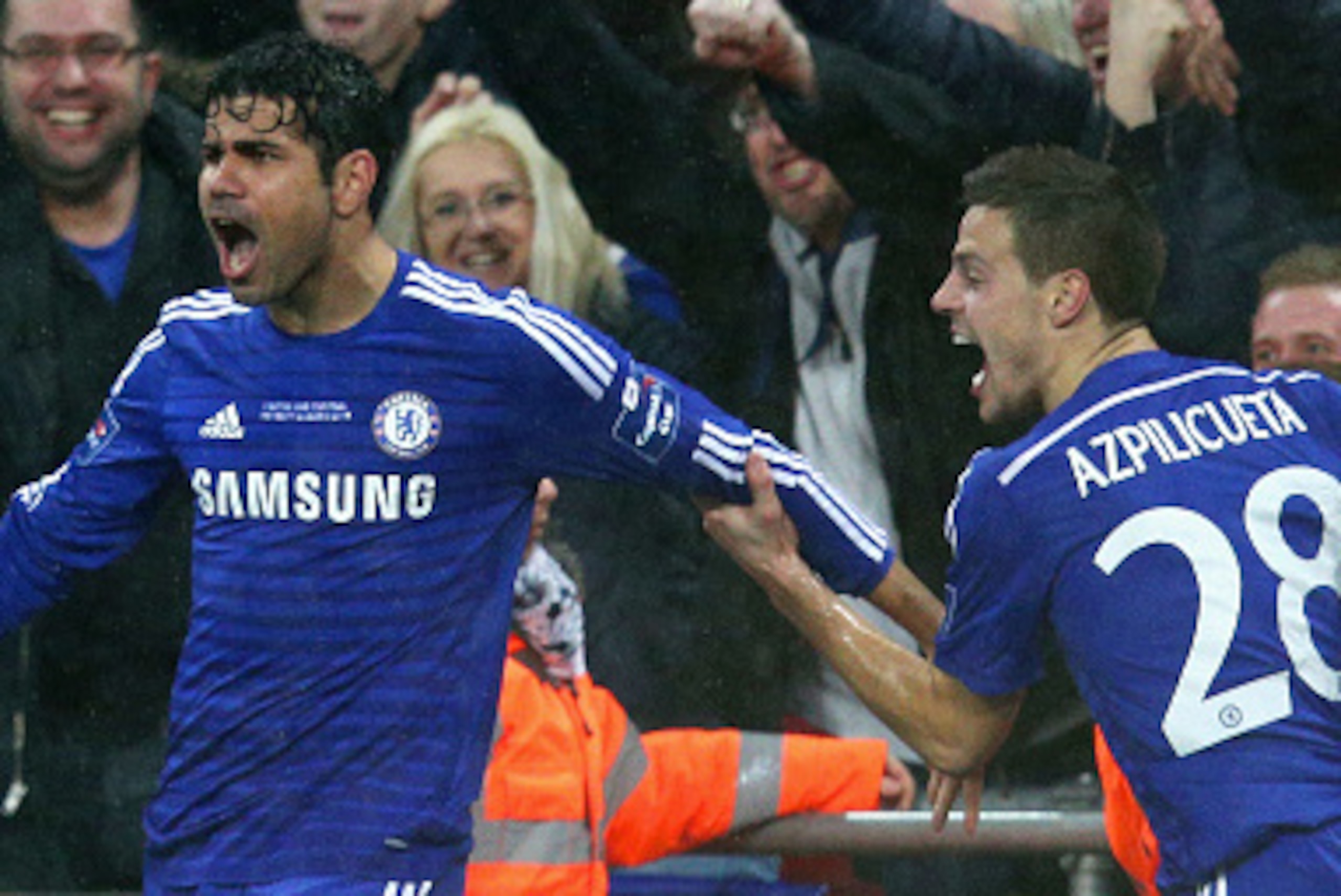 LONDON, ENGLAND - MARCH 01:  Diego Costa of Chelsea celebrates with Cesar Azpilicueta of Chelsea  after his shot on goal is deflected in for a second by Kyle Walker of Spurs during the Capital One Cup Final match between Chelsea and Tottenham Hotspur at W
