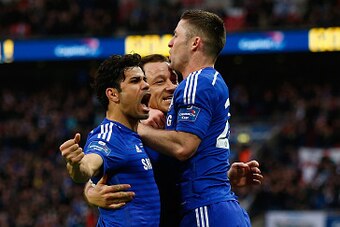 LONDON, ENGLAND - MARCH 01:  John Terry of Chelsea (C) celebrates scoring the opening goal with Diego Costa and Gary Cahill of Chelsea during the Capital One Cup Final match between Chelsea and Tottenham Hotspur at Wembley Stadium on March 1, 2015 in Lond