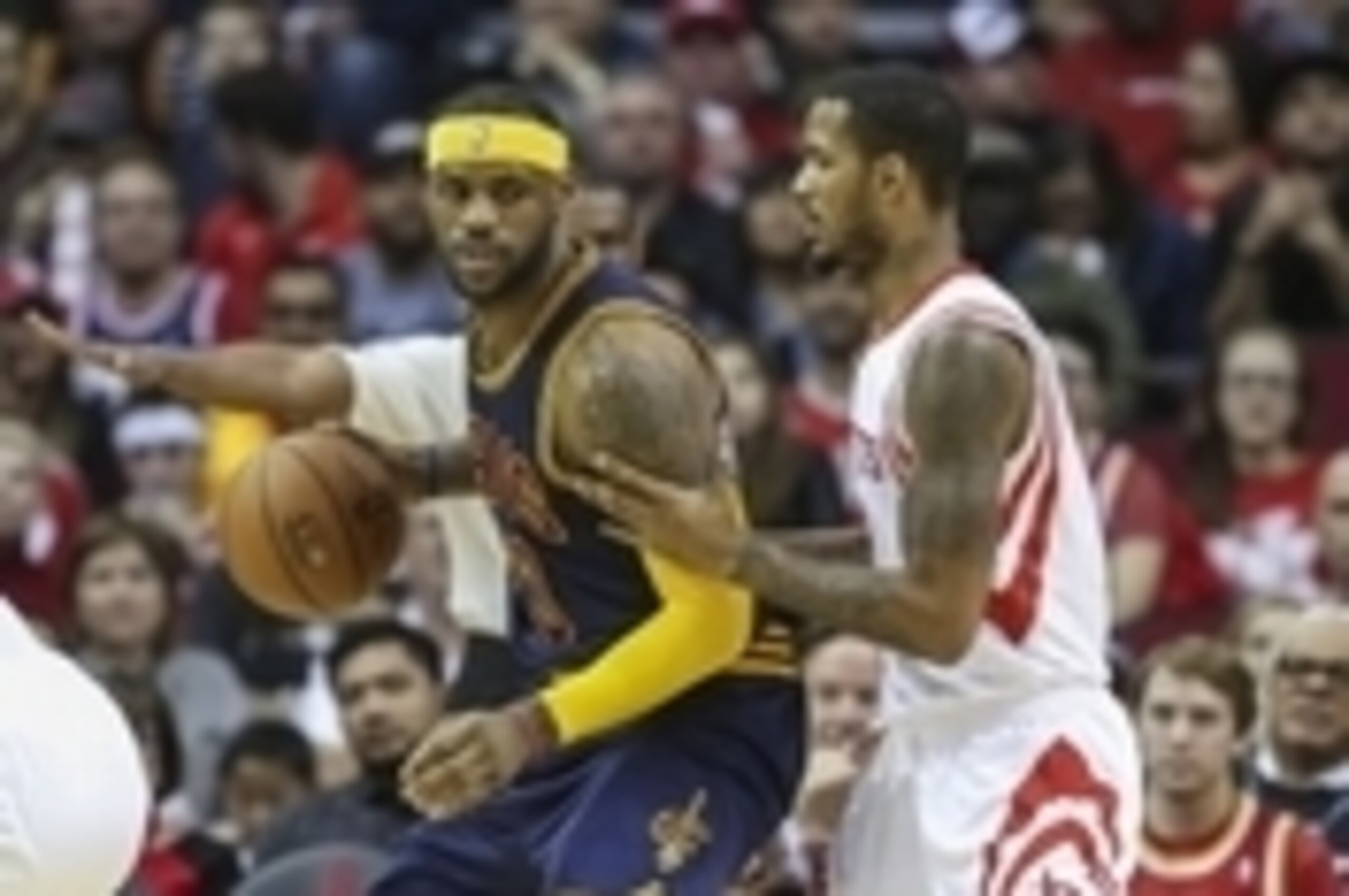 Mar 1, 2015; Houston, TX, USA; Cleveland Cavaliers forward LeBron James (23) controls the ball during the first quarter as Houston Rockets forward Trevor Ariza (1) defends at Toyota Center. Mandatory Credit: Troy Taormina-USA TODAY Sports