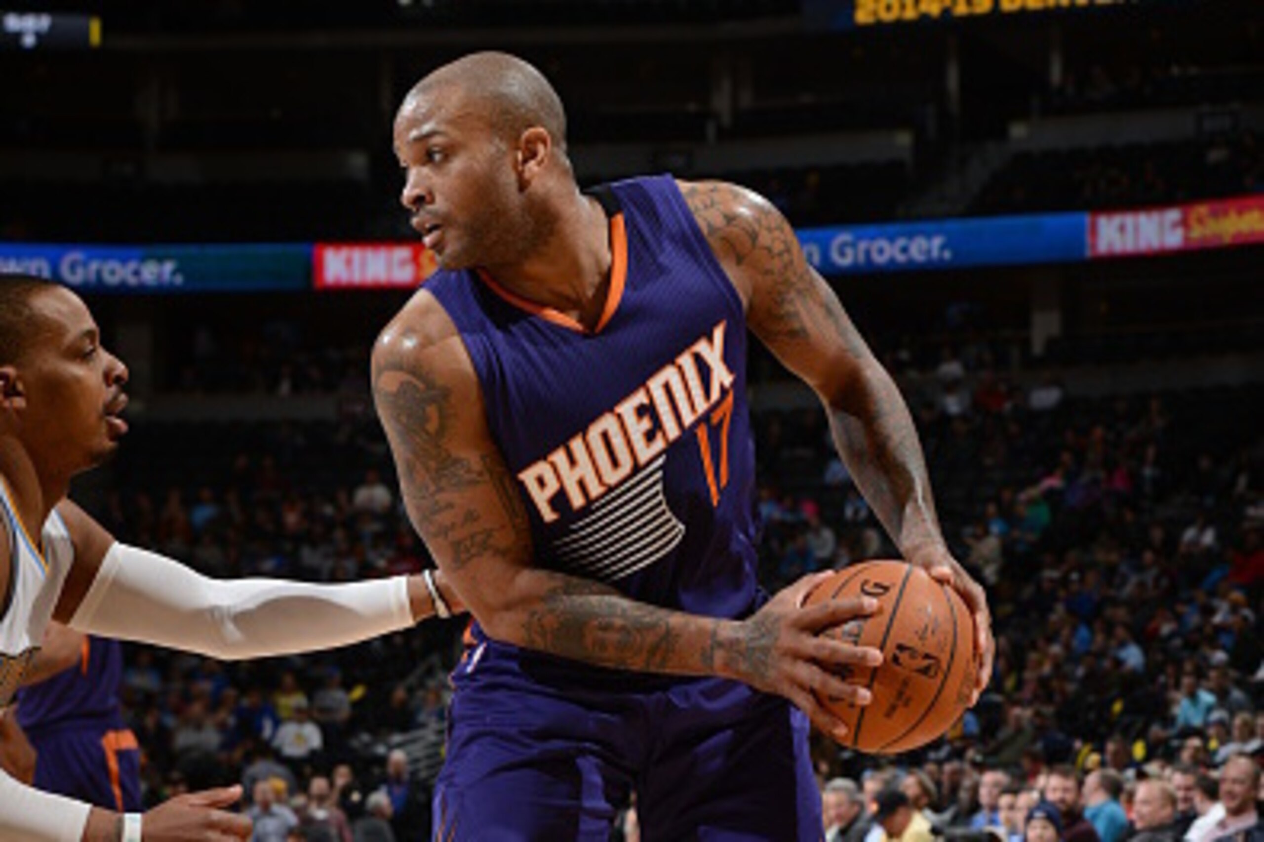 DENVER, CO - FEBRUARY 25:  P.J. Tucker #17 of the Phoenix Suns handles the ball against the Denver Nuggets on February 25, 2015 at the Pepsi Center in Denver, Colorado. NOTE TO USER: User expressly acknowledges and agrees that, by downloading and or using
