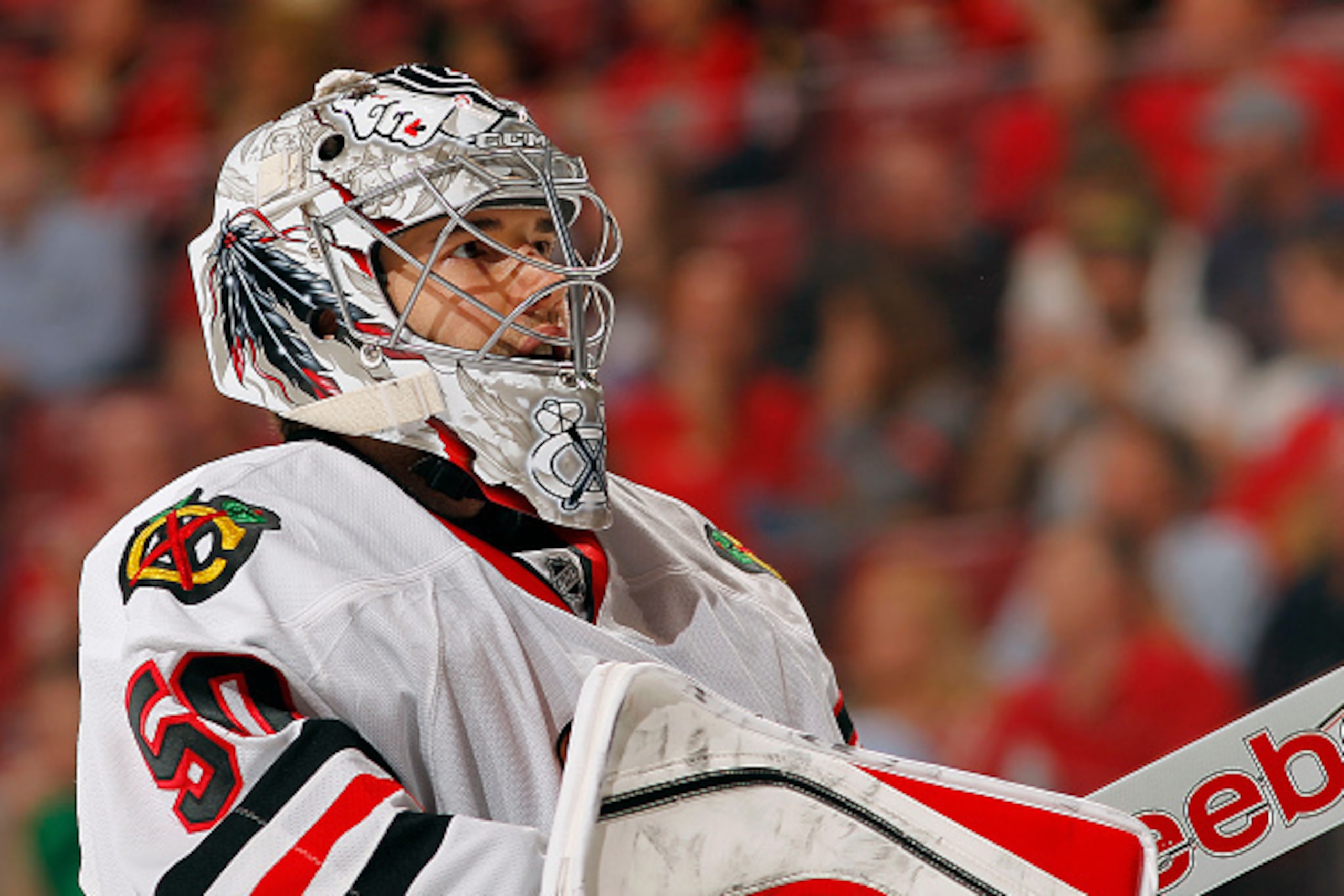 SUNRISE, FL - FEBRUARY 26: Goaltender Corey Crawford #50 of the Chicago Blackhawks skates back to the net after a break in the action against the Florida Panthers at the BB&T Center on February 26, 2015 in Sunrise, Florida. (Photo by Eliot J. Schechter/NH