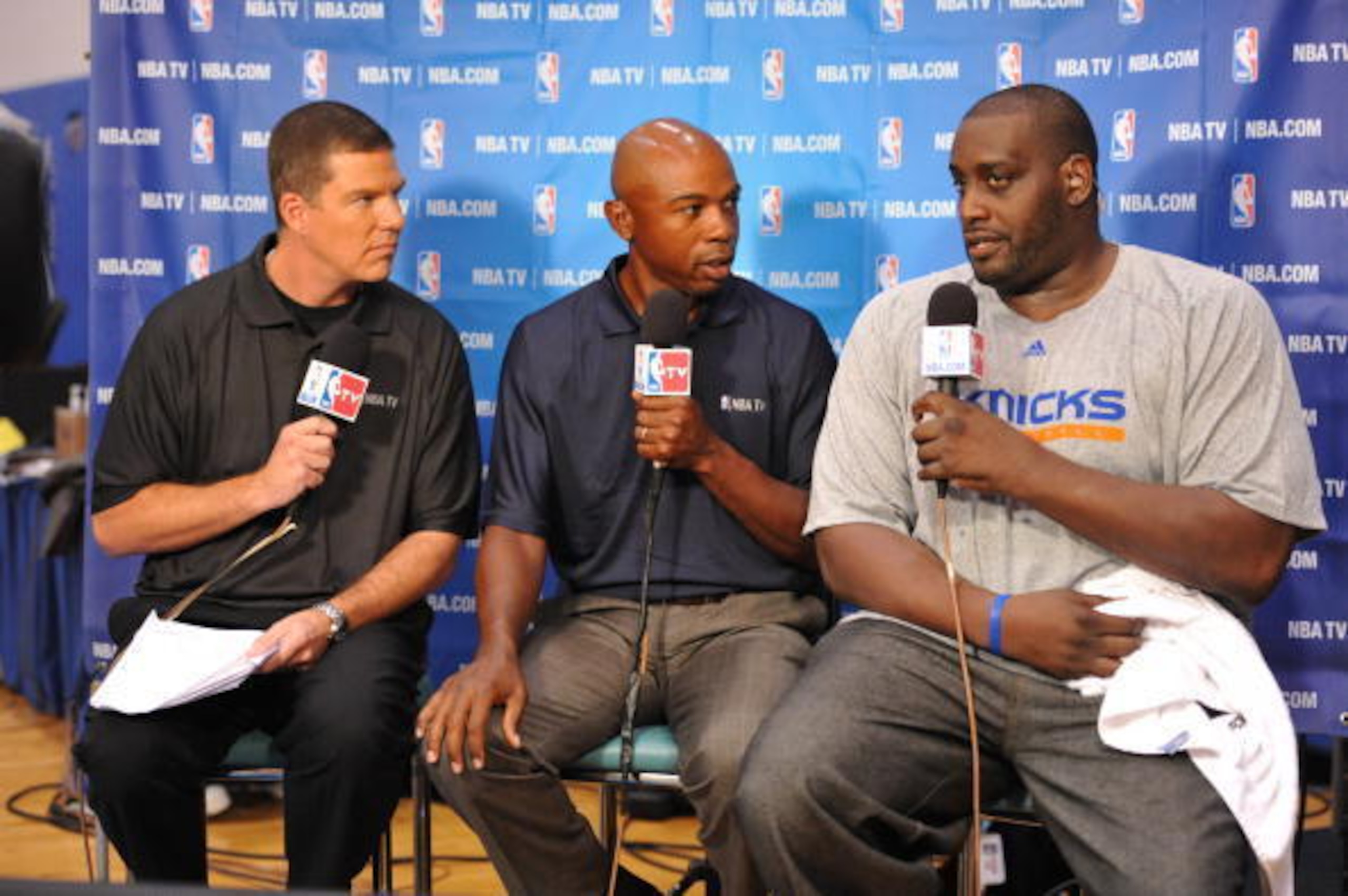 TARRYTOWN, NY - SEPTEMBER 28: Rick Kamla, Greg Anthony, and Anthony Mason talk during the practice of the New York Knicks on September 28, 2010 at the MSG Training Facility in Tarrytown, New York. NOTE TO USER: User expressly acknowledges and agrees that,