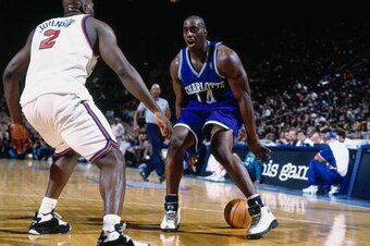 NEW YORK - APRIL 24:  Anthony Mason #14 of the Charlotte Hornets dribbles against Larry Johnson #2 of the New York Knicks in Game One of the Eastern Conference Quarterfinals during the 1997 NBA Playoffs at Madison Square Garden on April 24, 1997 in New Yo