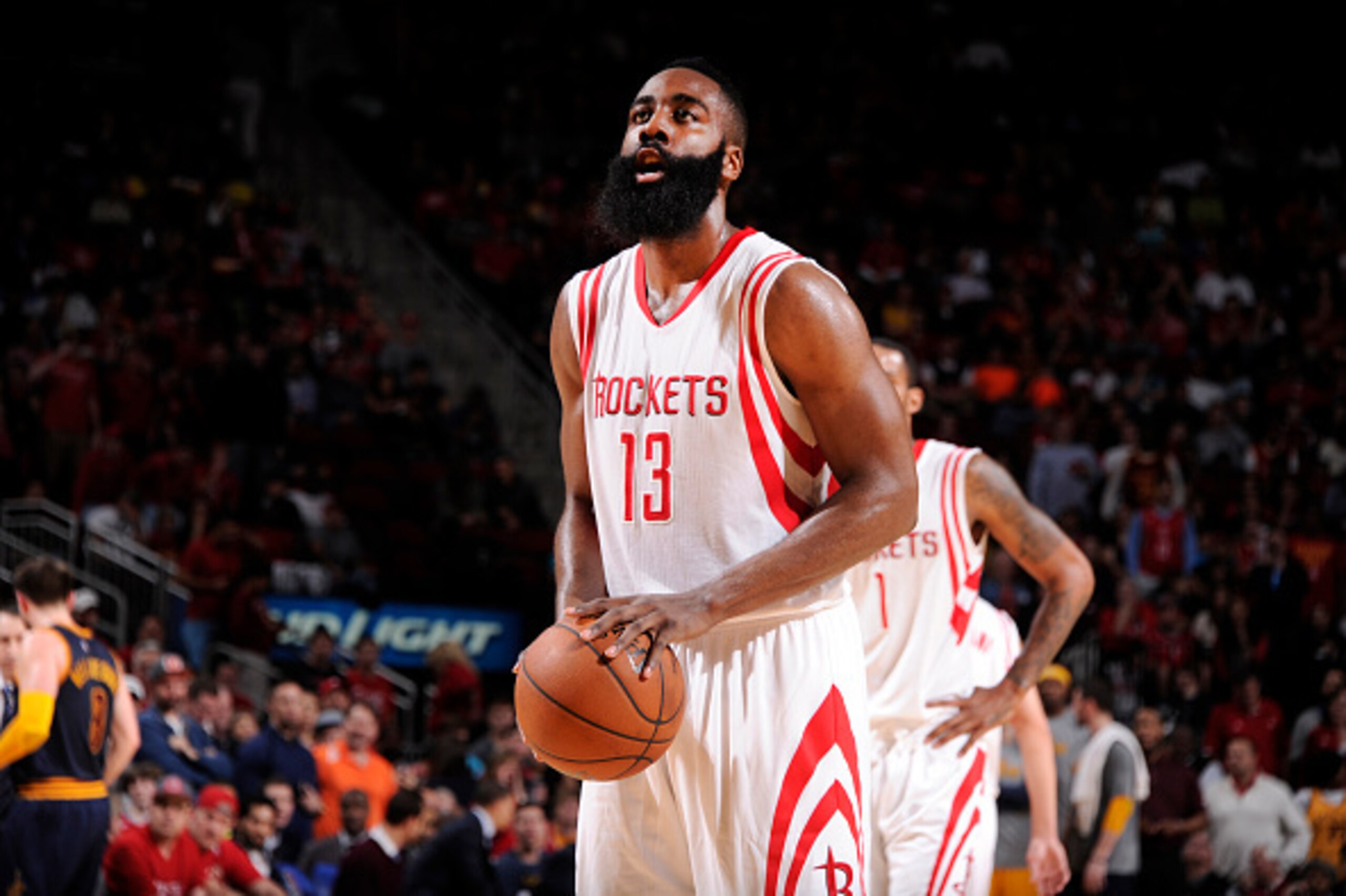 HOUSTON, TX - MARCH 1: James Harden #13 of the Houston Rockets prepares to shoot the ball against the Cleveland Cavaliers during the game on March 1, 2015 at the Toyota Center in Houston, Texas. NOTE TO USER: User expressly acknowledges and agrees that, b