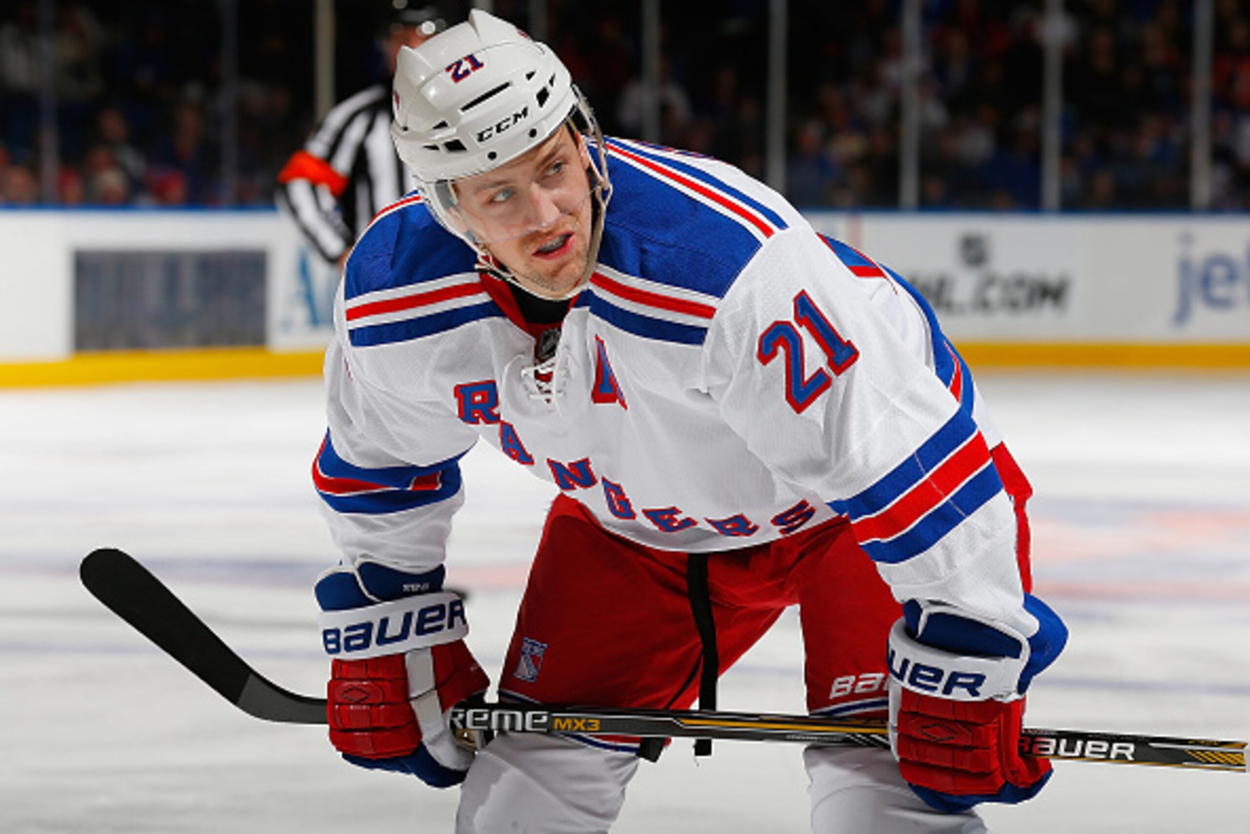 UNIONDALE, NY - FEBRUARY 16:  Derek Stepan #21 of the New York Rangers skates against the New York Islanders at Nassau Veterans Memorial Coliseum on February 16, 2015 in Uniondale, New York. Rangers defeated the Islanders 6-5.  (Photo by Mike Stobe/NHLI v