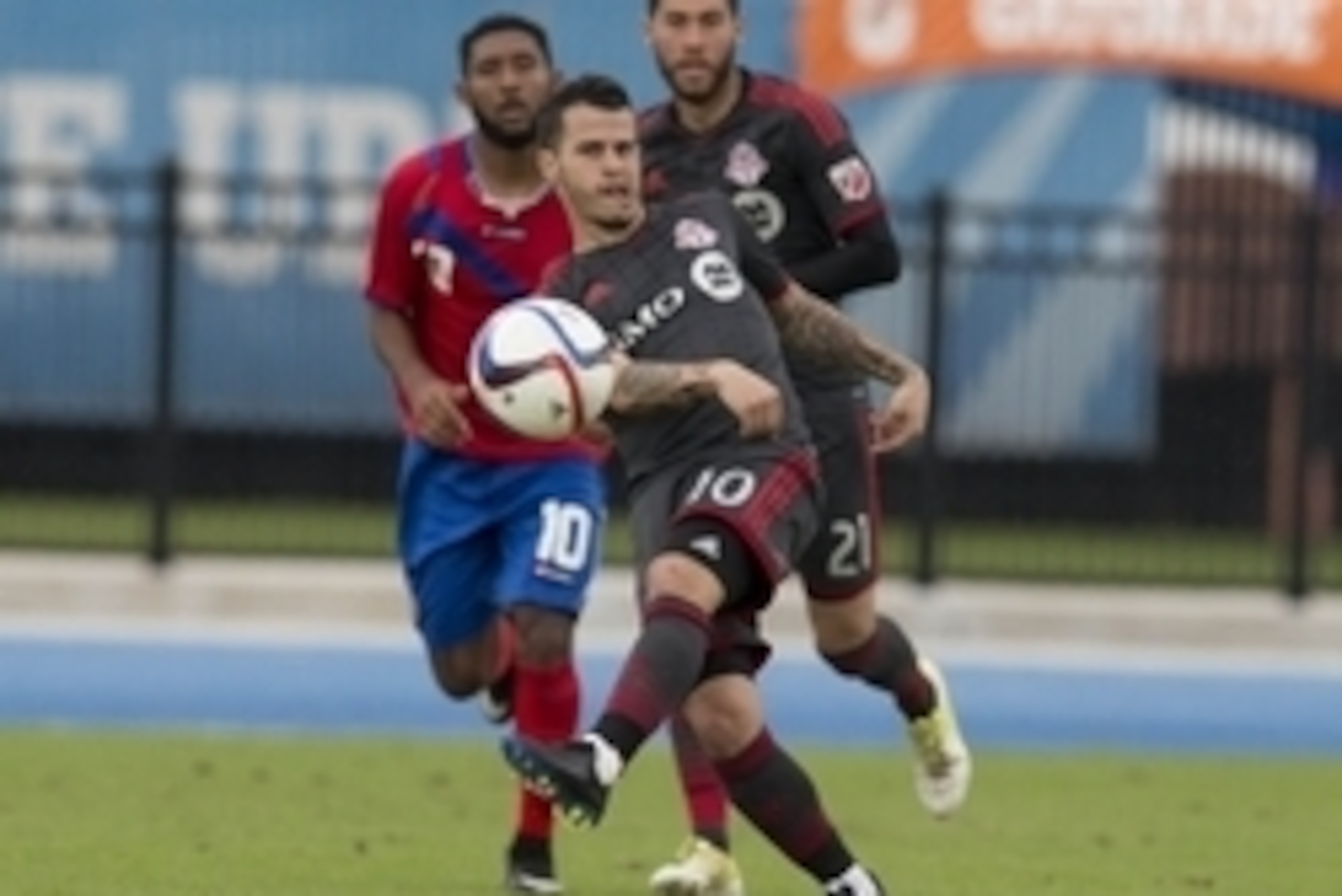 Feb 28, 2015; Bradenton, FL, USA; Toronto FC midfielder Sebastian Giovinco (10) sends the ball forward against the U23 Costa Rica National Team  during the IMG Suncoast Pro Classic at IMG Academy Stadium. Mandatory Credit: Greg Bartram-USA TODAY Sports