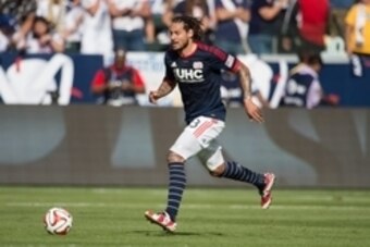 Dec 7, 2014; Los Angeles, CA, USA; New England Revolution midfielder Jermaine Jones (13) dribbles the soccer ball during the first half in the 2014 MLS Cup final against the Los Angeles Galaxy at Stubhub Center. Mandatory Credit: Kyle Terada-USA TODAY Spo