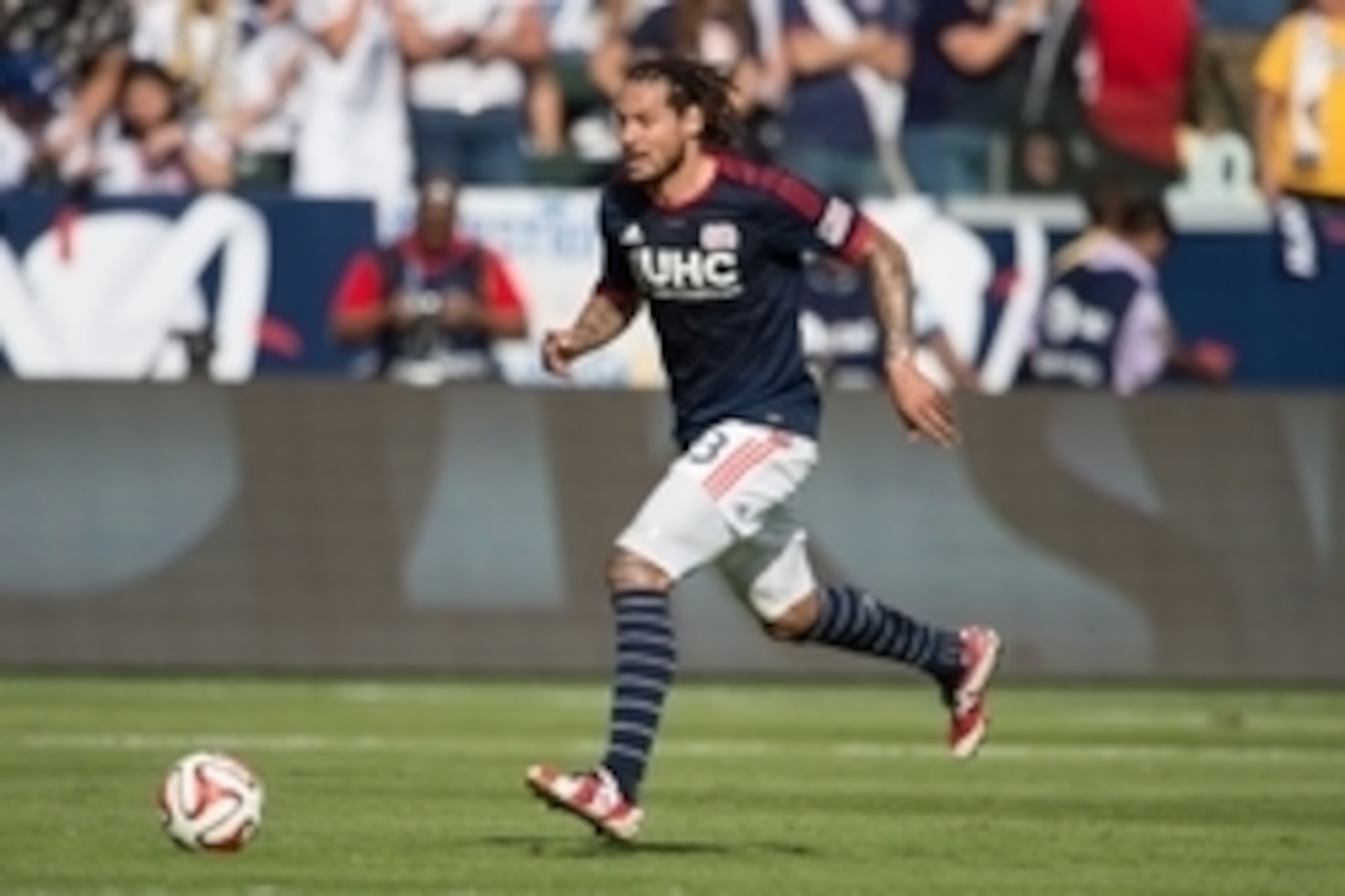 Dec 7, 2014; Los Angeles, CA, USA; New England Revolution midfielder Jermaine Jones (13) dribbles the soccer ball during the first half in the 2014 MLS Cup final against the Los Angeles Galaxy at Stubhub Center. Mandatory Credit: Kyle Terada-USA TODAY Spo