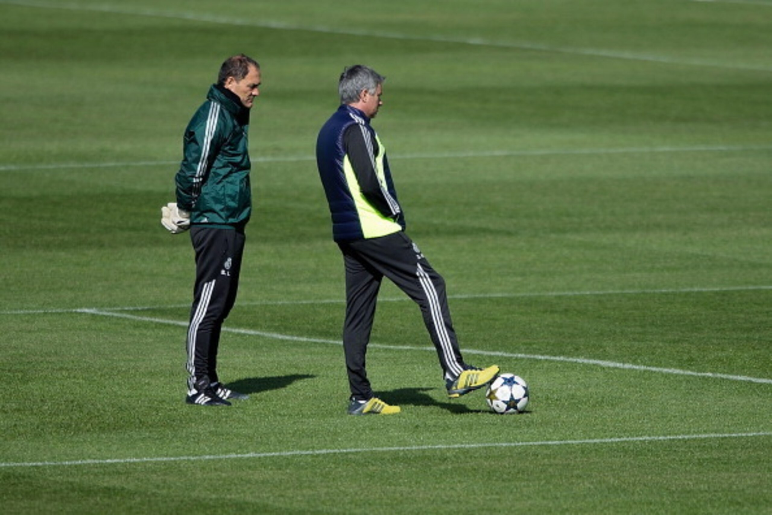 MADRID, SPAIN - APRIL 02:  head coach Jose Mourinho (R) talks with goalkeepers coach Silvino Louro (L) during a training session ahead of the UEFA Champions League Quarterfinal match between Real Madrid and Galatasaray AS at the Valdebebas training ground
