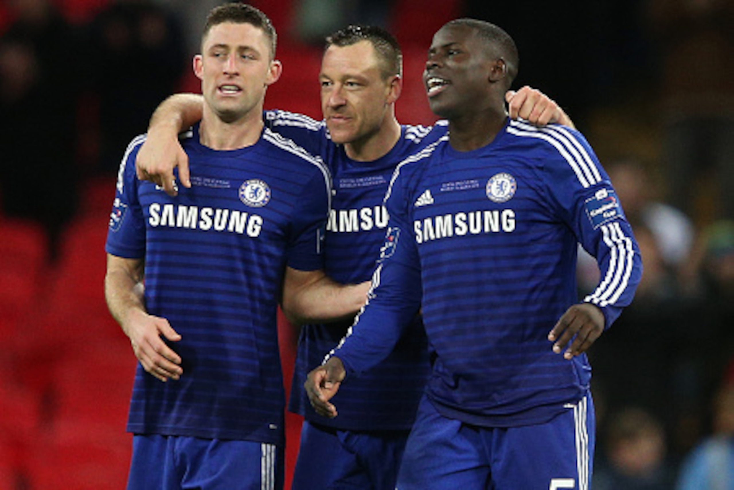 LONDON, ENGLAND - MARCH 01:  (L-R) Gary Cahill, John Terry and Kurt Zouma of Chelsea celebrate after victory in the Capital One Cup Final match between Chelsea and Tottenham Hotspur at Wembley Stadium on March 1, 2015 in London, England.  (Photo by Clive 