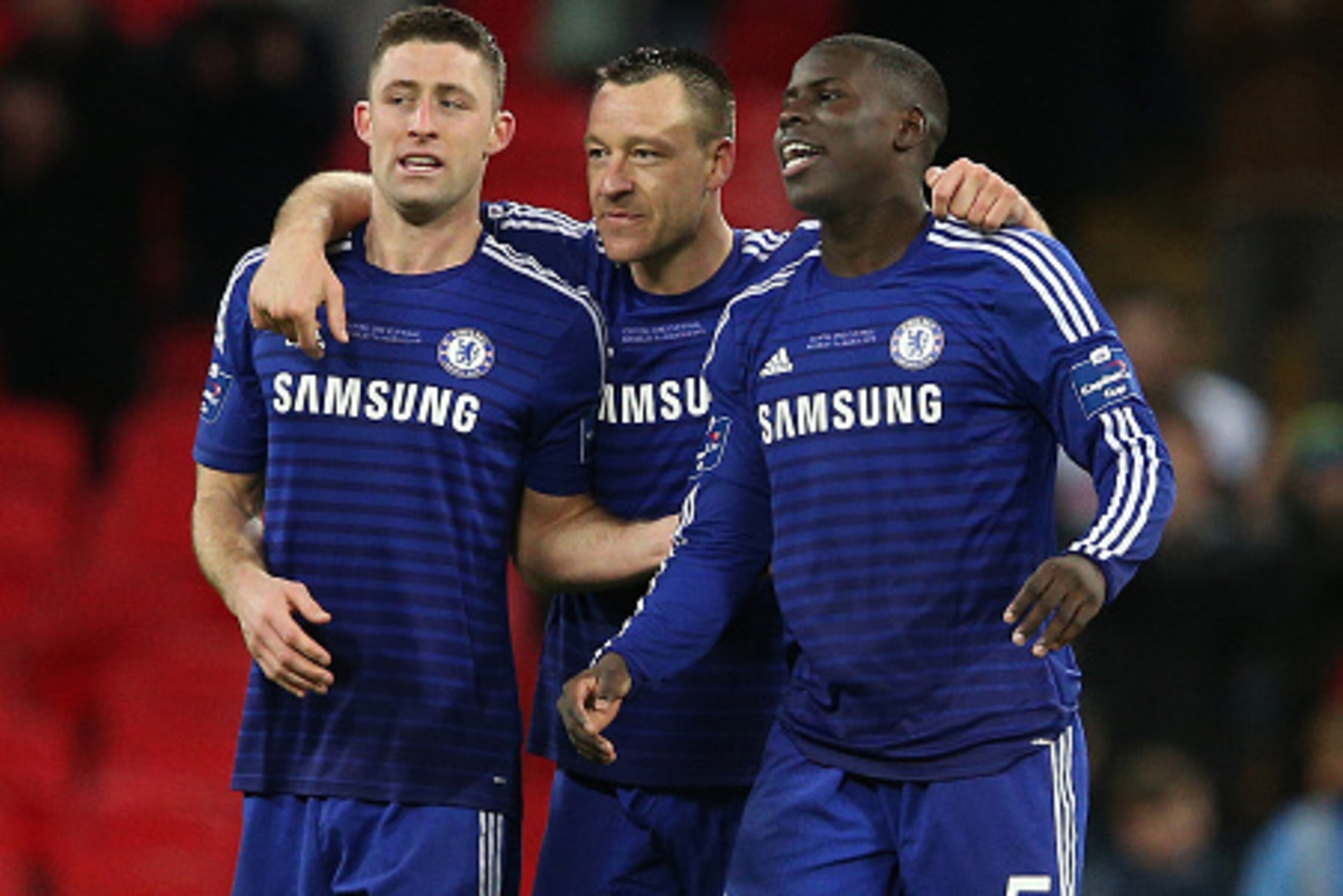 LONDON, ENGLAND - MARCH 01:  (L-R) Gary Cahill, John Terry and Kurt Zouma of Chelsea celebrate after victory in the Capital One Cup Final match between Chelsea and Tottenham Hotspur at Wembley Stadium on March 1, 2015 in London, England.  (Photo by Clive 