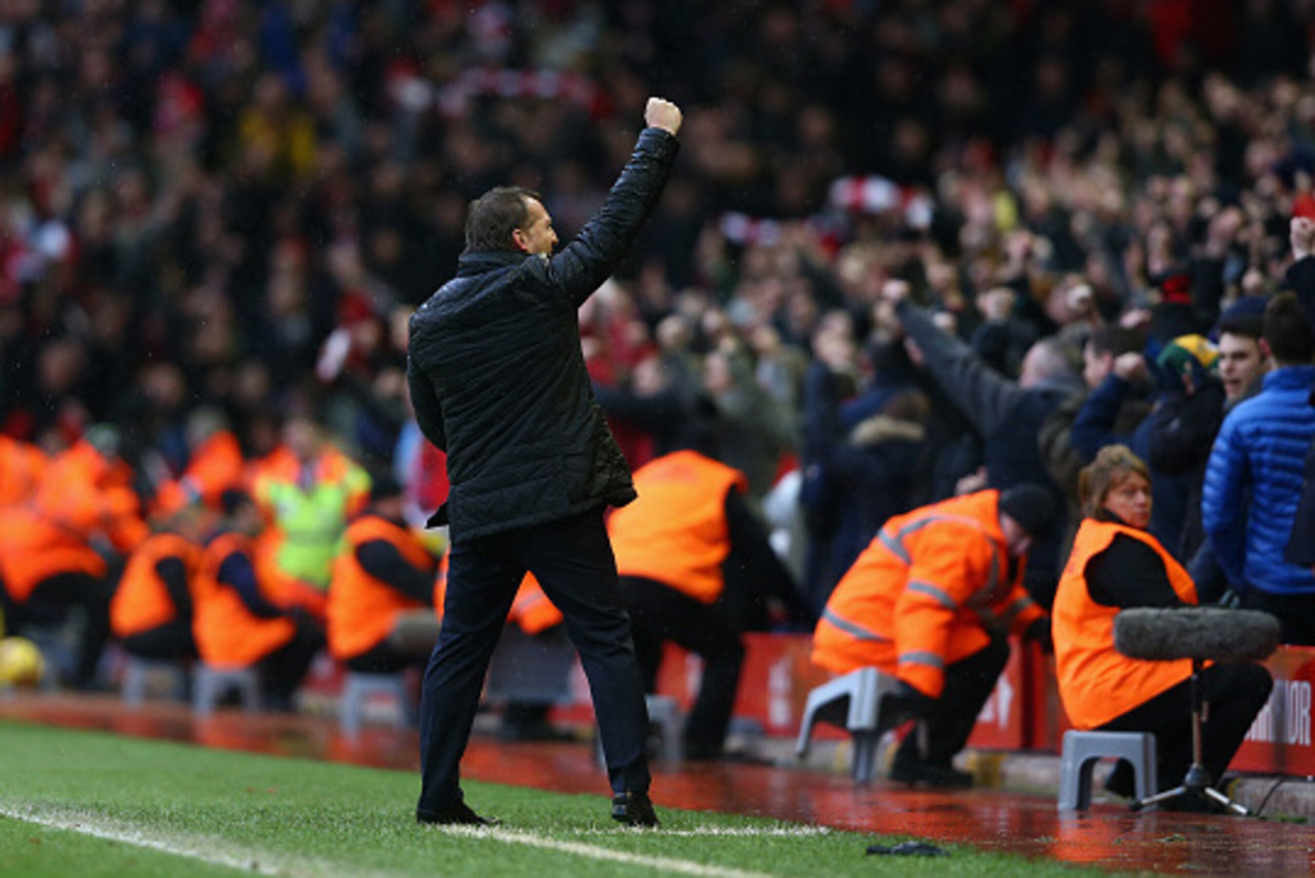 LIVERPOOL, ENGLAND - MARCH 01:  Liverpool manager Brendan Rodgers celebrates to the crowd after his teams 2-1 victory at the final whistle during the Barclays Premier League match between Liverpool and Manchester City at Anfield on March 1, 2015 in Liverp