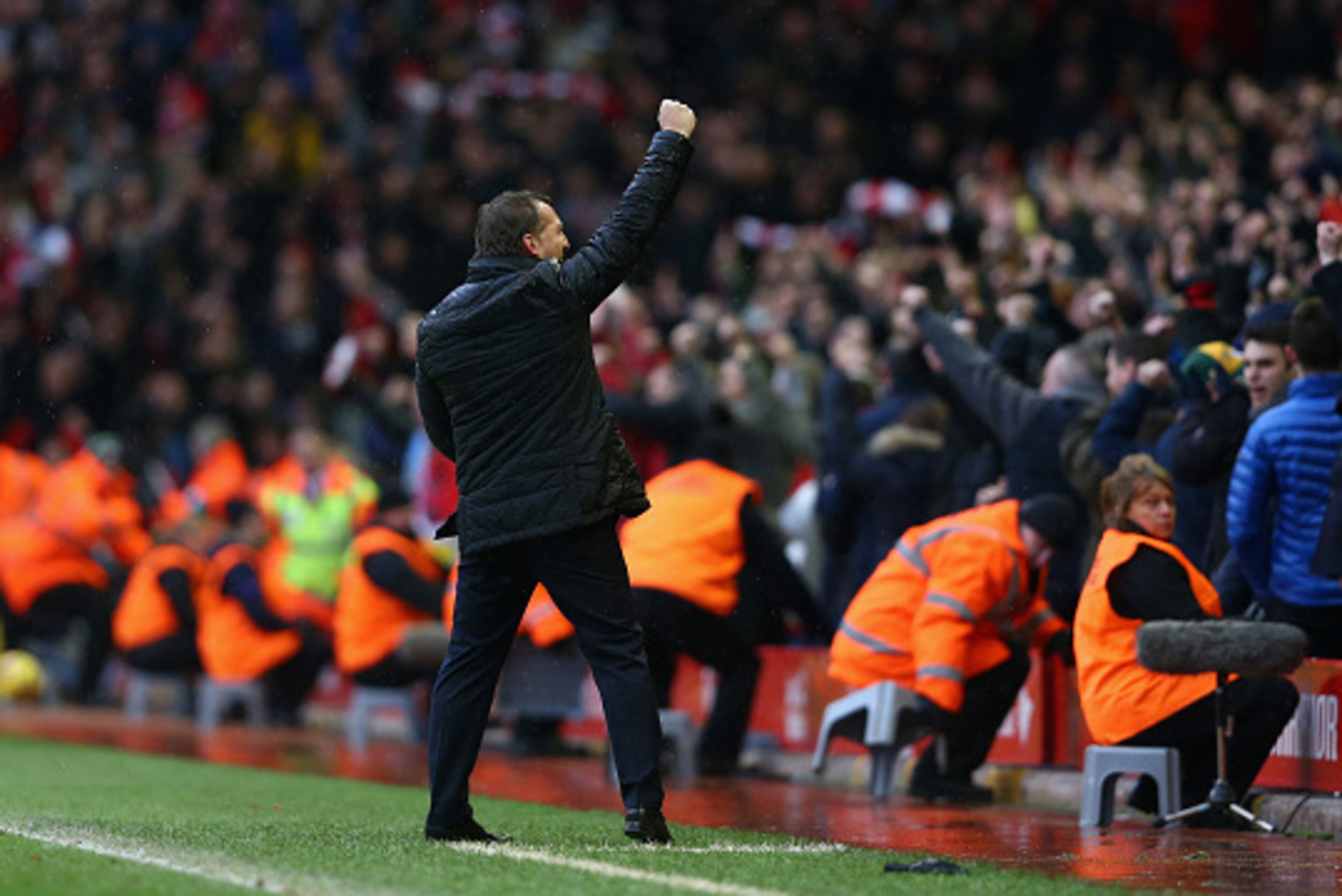 LIVERPOOL, ENGLAND - MARCH 01:  Liverpool manager Brendan Rodgers celebrates to the crowd after his teams 2-1 victory at the final whistle during the Barclays Premier League match between Liverpool and Manchester City at Anfield on March 1, 2015 in Liverp
