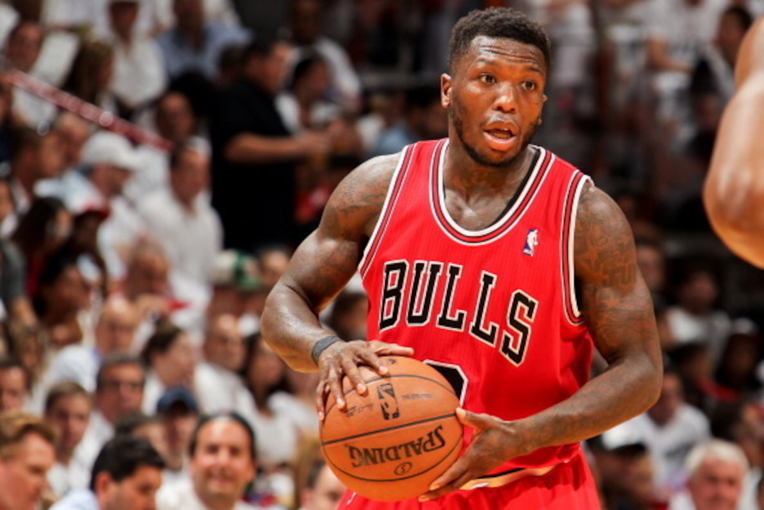 MIAMI, FL - MAY 15: Nate Robinson #2 of the Chicago Bulls looks to pass the ball against the Miami Heat in Game Five of the Eastern Conference Semifinals during the 2013 NBA Playoffs on May 15, 2013 at American Airlines Arena in Miami, Florida. NOTE TO US