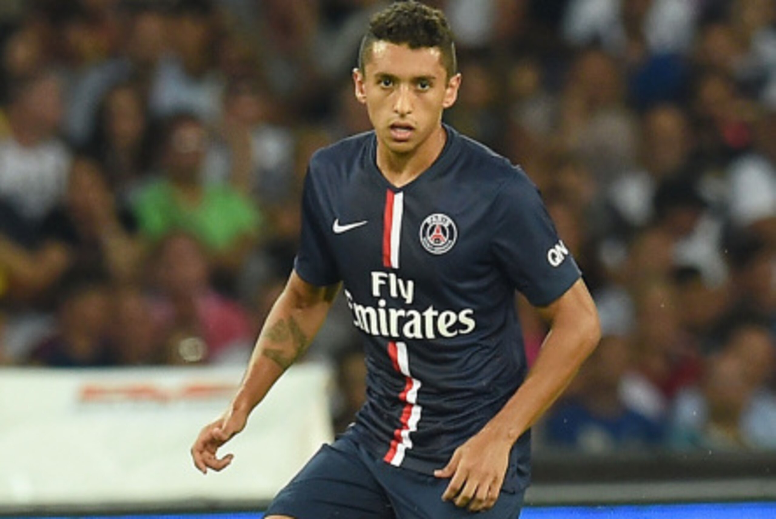 NAPLES, ITALY - AUGUST 11:  Marquinhos of Paris Saint Germain  in action during the pre-season friendly match between SSC Napoli and Paris Saint-Germain FC at Stadio San Paolo on August 11, 2014 in Naples, Italy.  (Photo by Giuseppe Bellini/Getty Images)