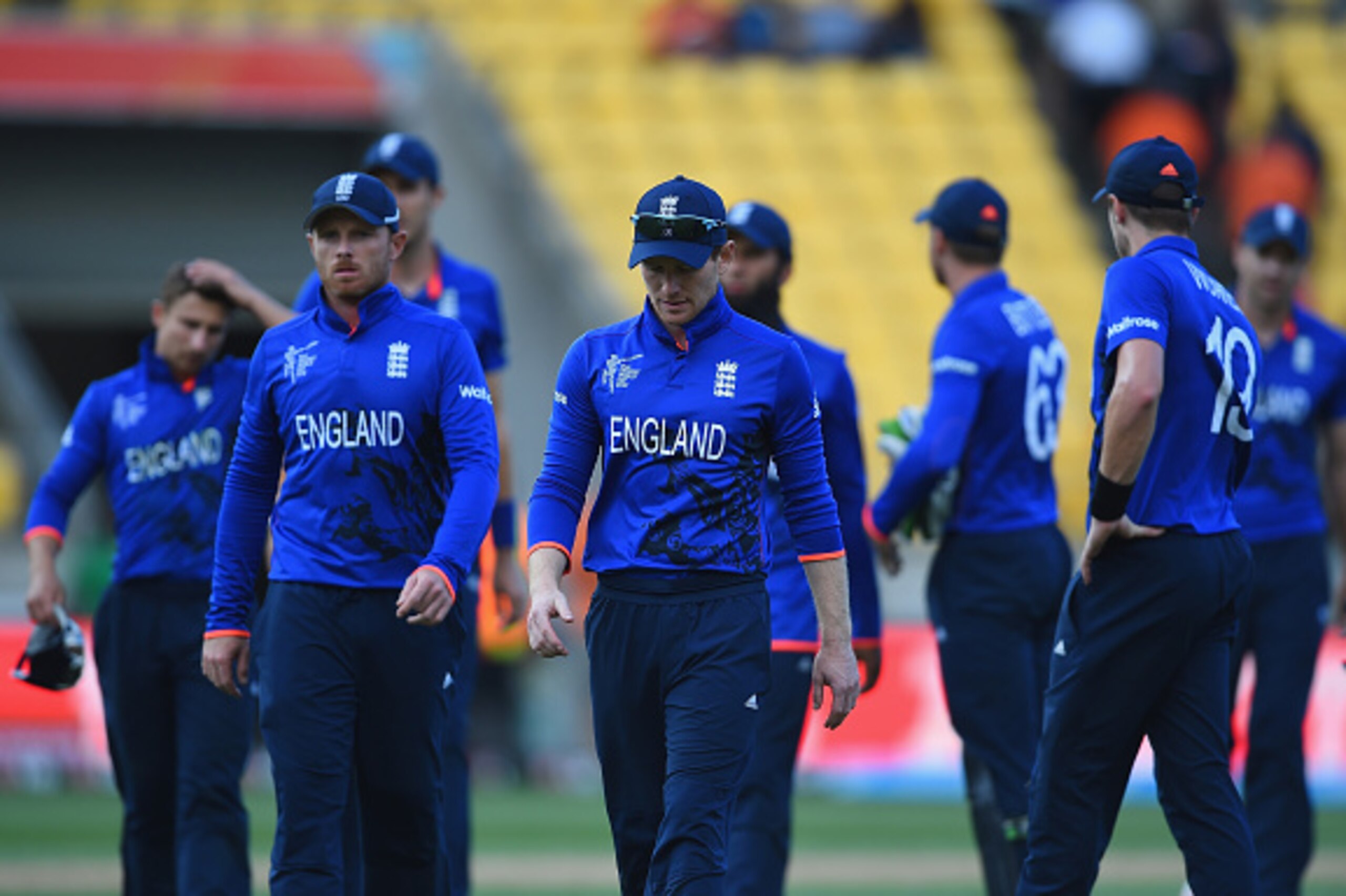 WELLINGTON, NEW ZEALAND - MARCH 01:  England captain Eoin Morgan leads his team off at the end of the 2015 ICC Cricket World Cup match between England and Sri Lanka at Wellington Regional Stadium on March 1, 2015 in Wellington, New Zealand.  (Photo by Sha