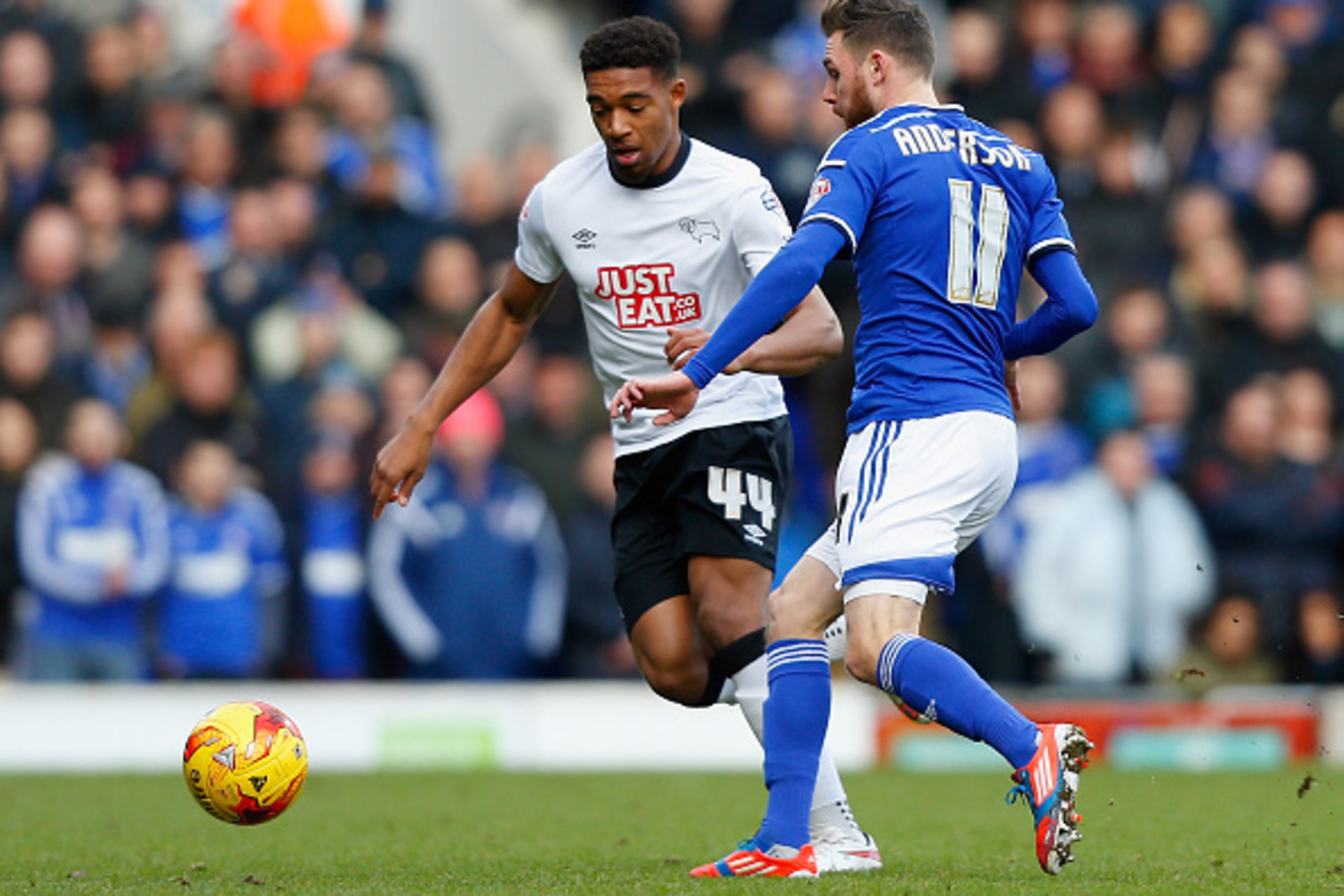 IPSWICH, ENGLAND - JANUARY 10: Jordon Ibe of Derby County (L) and Paul Anderson of Ipswich battle for the ball during the Sky Bet Championship match between Ipswich Town and Derby County at Portman Road on January 10, 2015 in Ipswich, England. (Photo by IPSWICH, ENGLAND - JANUARY 10: Jordon Ibe of Derby County (L) and Paul Anderson of Ipswich battle for the ball during the Sky Bet Championship match between Ipswich Town and Derby County at Portman Road on January 10, 2015 in Ipswich, England. (Photo by