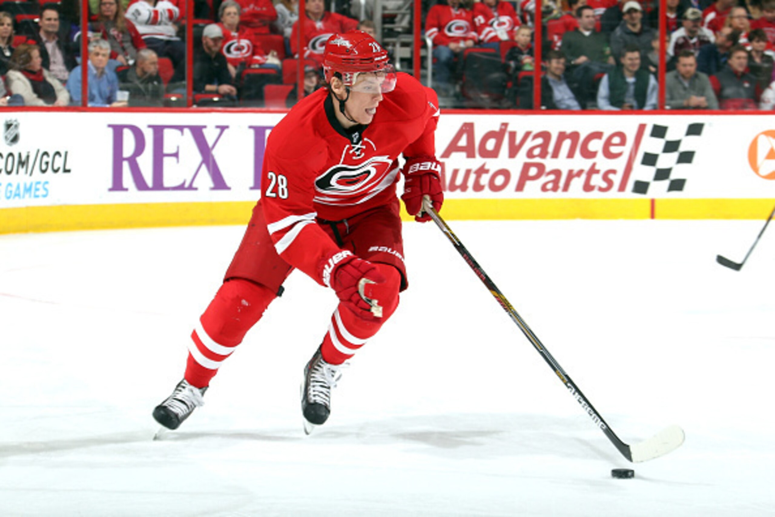 RALEIGH, NC - JANUARY 16: Alexander Semin #28 of the Carolina Hurricanes moves the puck through the neutral zone against the Vancouver Canucks during their NHL game at PNC Arena on January 16, 2015 in Raleigh, North Carolina. (Photo by Gregg Forwerck/NHLI