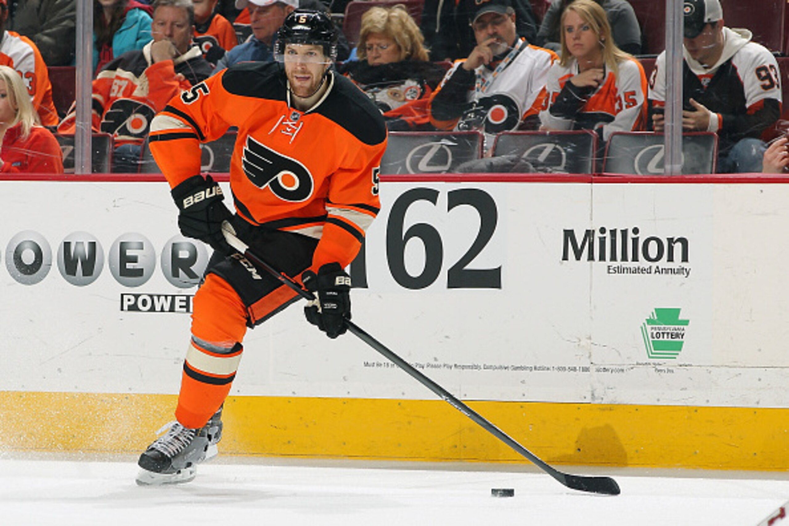 PHILADELPHIA, PA - JANUARY 10:  Braydon Coburn #5 of the Philadelphia Flyers skates the puck against the Boston Bruins on January 10, 2015 at the Wells Fargo Center in Philadelphia, Pennsylvania.  (Photo by Len Redkoles/NHLI via Getty Images)
