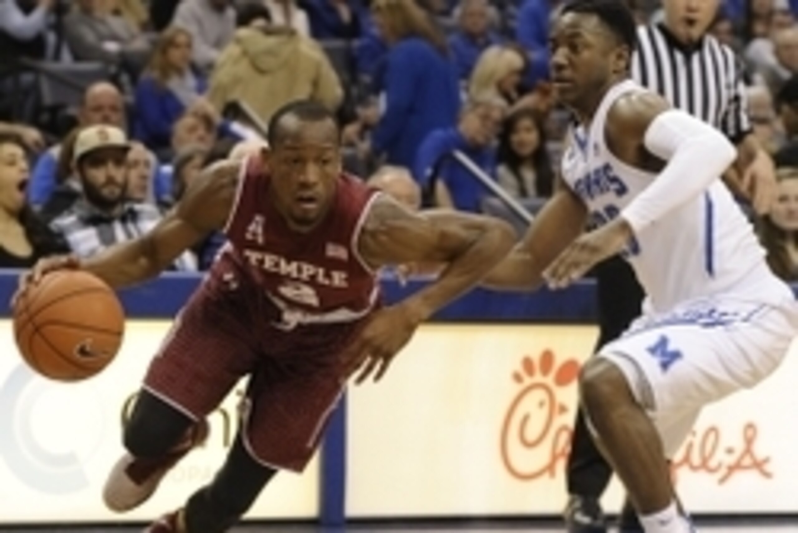 Feb 7, 2015; Memphis, TN, USA; Temple Owls guard Will Cummings (2) drives past Memphis Tigers guard Avery Woodson (20) during the game during the game at FedExForum. Mandatory Credit: Justin Ford-USA TODAY Sports