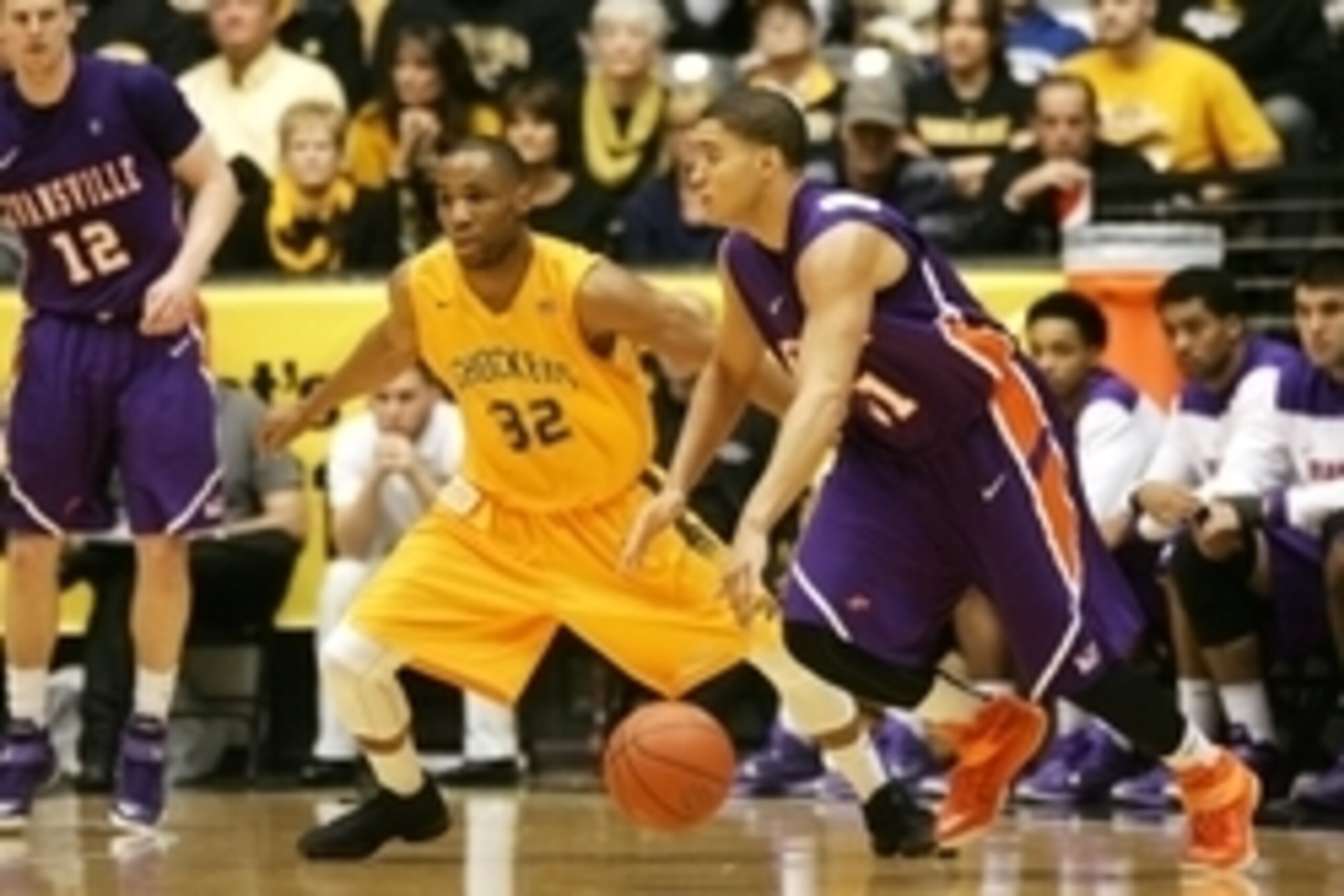 Feb 22, 2015; Wichita, KS, USA; Evansville Purple Aces guard D.J. Balentine (31) dribbles against Wichita State Shockers guard Tekele Cotton (32) during the Purple Aces' 62-43 loss at Charles Koch Arena. Mandatory Credit: Scott Sewell-USA TODAY Sports Feb 22, 2015; Wichita, KS, USA; Evansville Purple Aces guard D.J. Balentine (31) dribbles against Wichita State Shockers guard Tekele Cotton (32) during the Purple Aces' 62-43 loss at Charles Koch Arena. Mandatory Credit: Scott Sewell-USA TODAY Sports