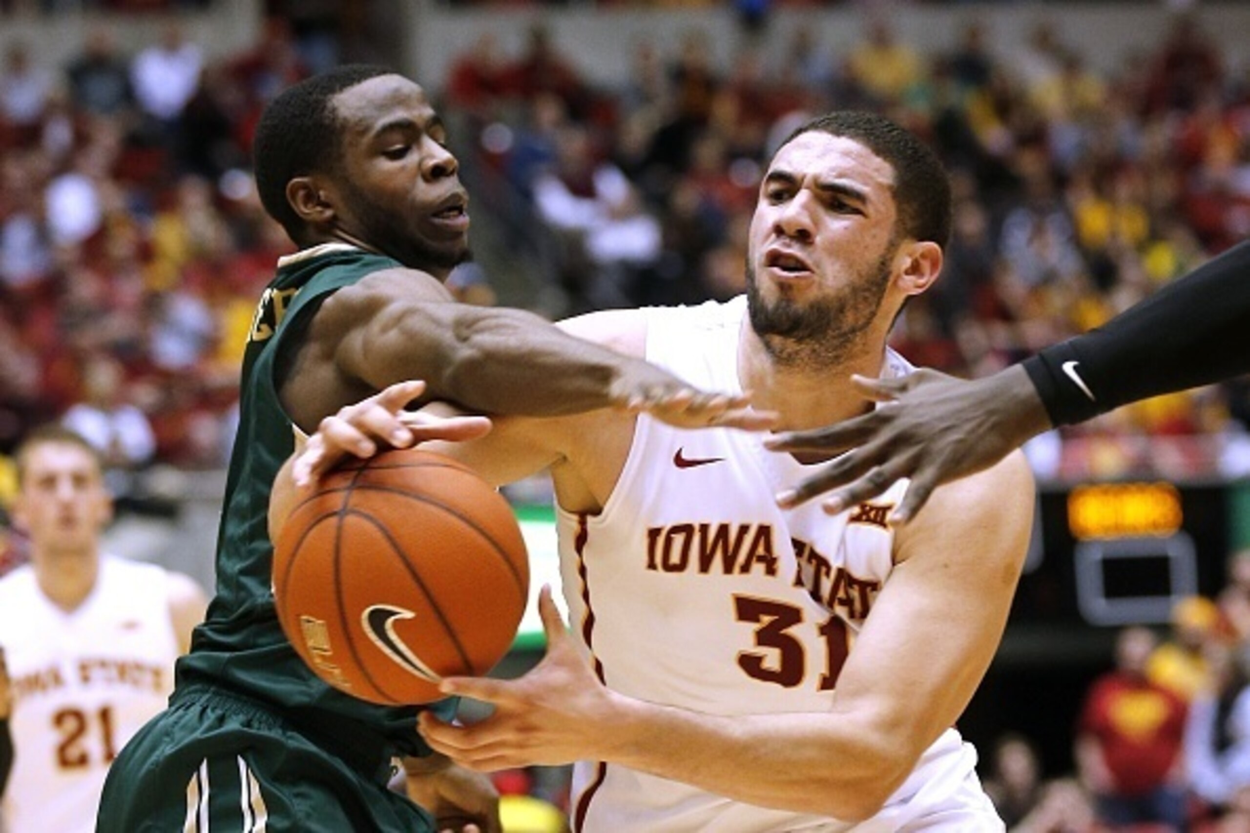 AMES, IA - FEBRUARY 25: Georges Niang #31 of the Iowa State Cyclones is fouled by Kenny Chery #1 of the Baylor Bears as he drives the ball in the first half of play at Hilton Coliseum on February 25, 2015 in Ames, Iowa. (Photo by David Purdy/Getty Images) AMES, IA - FEBRUARY 25: Georges Niang #31 of the Iowa State Cyclones is fouled by Kenny Chery #1 of the Baylor Bears as he drives the ball in the first half of play at Hilton Coliseum on February 25, 2015 in Ames, Iowa. (Photo by David Purdy/Getty Images)
