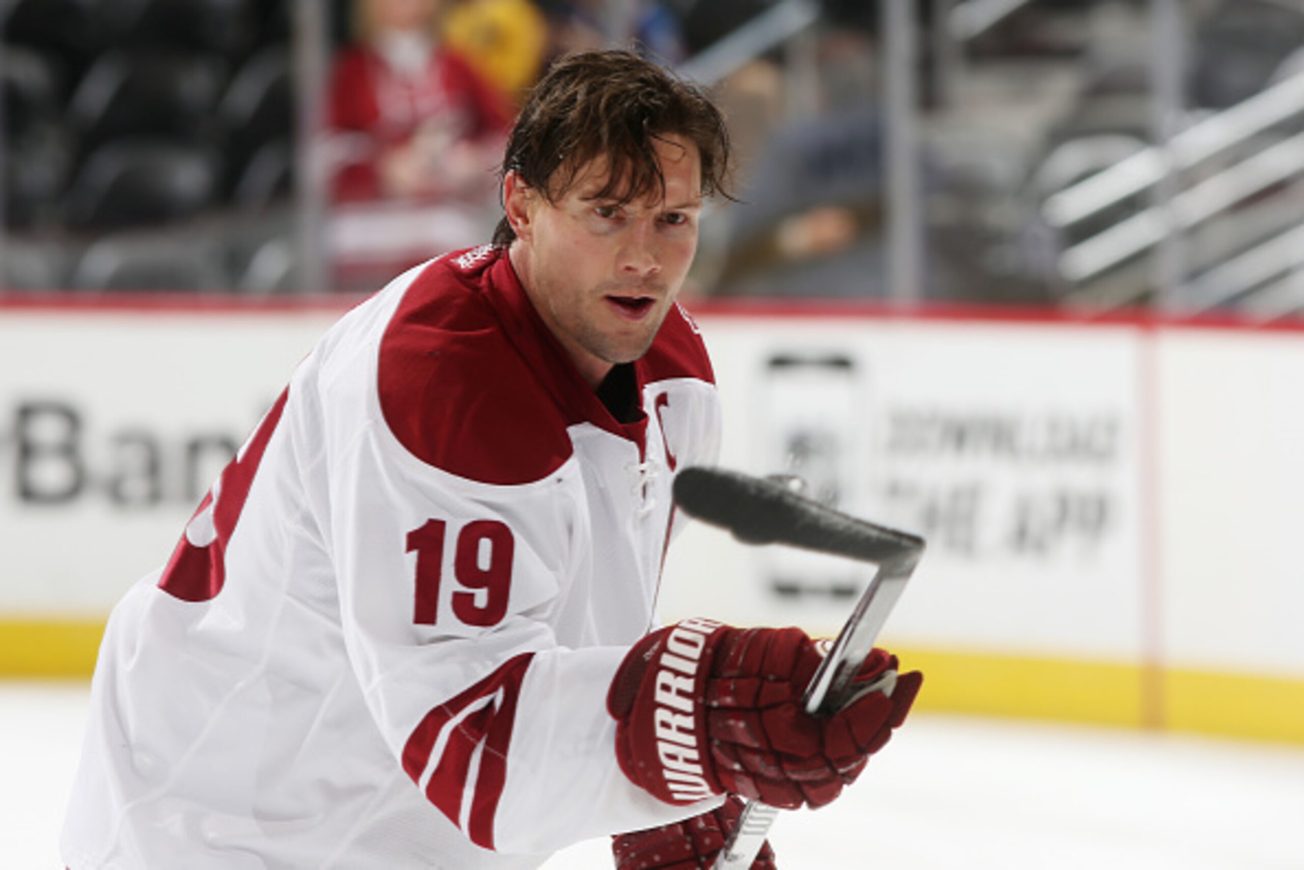 DENVER, CO - FEBRUARY 16: Shane Doan #19 of the Arizona Coyotes juggles a puck prior to the game against the Colorado Avalanche at the Pepsi Center on February 16, 2015 in Denver, Colorado.  (Photo by Michael Martin/NHLI via Getty Images)