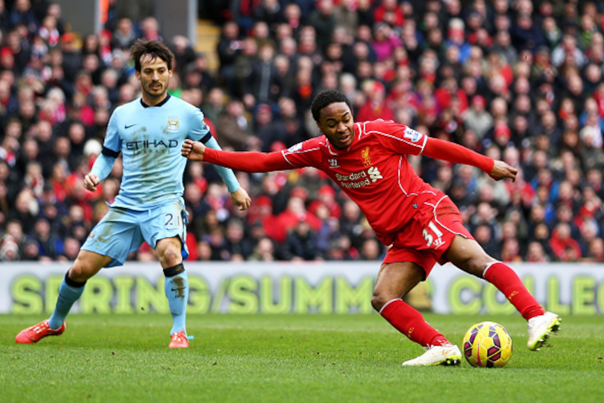 LIVERPOOL, ENGLAND - MARCH 01:  Raheem Sterling of Liverpool directs a shot on goal during the Barclays Premier League match between Liverpool and Manchester City at Anfield on March 1, 2015 in Liverpool, England.  (Photo by Clive Brunskill/Getty Images)