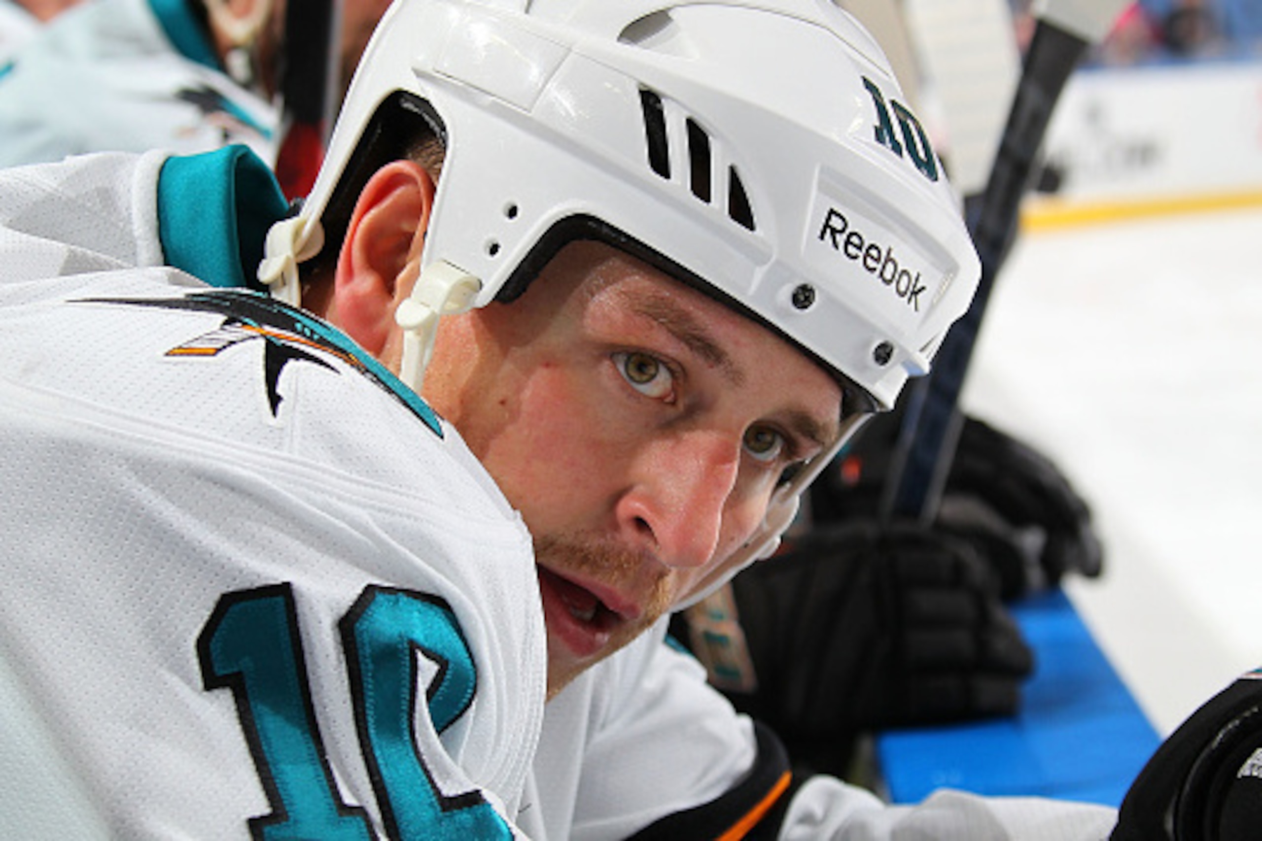 BUFFALO, NY - NOVEMBER 18:  Andrew Desjardins #10 of the San Jose Sharks watches the action against the Buffalo Sabres on November 18, 2014 at the First Niagara Center in Buffalo, New York.  (Photo by Bill Wippert/NHLI via Getty Images)