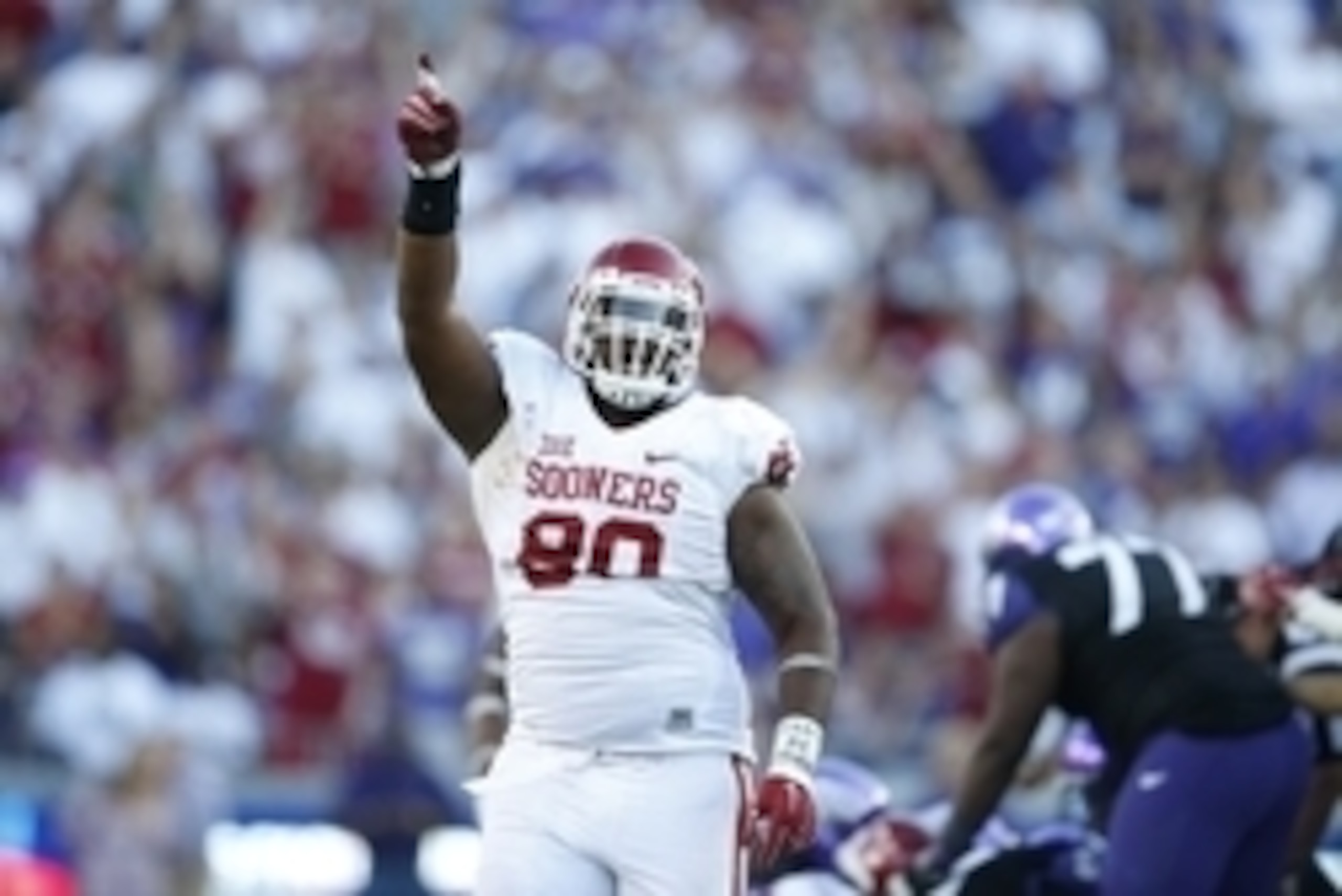 Oct 4, 2014; Fort Worth, TX, USA; Oklahoma Sooners defensive tackle Jordan Phillips (80) celebrates a turnover against the TCU Horned Frogs at Amon G. Carter Stadium. Mandatory Credit: Matthew Emmons-USA TODAY Sports