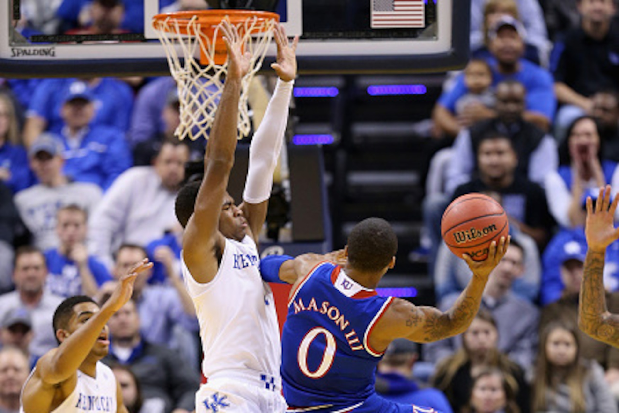 INDIANAPOLIS, IN - NOVEMBER 18: Andrew Harrison #5 of the Kentucky Wildcats defends the shot of Frank Mason III #0 of the Kansas Jayhawks in the State Farm Champions Classic at Bankers Life Fieldhouse on November 18, 2014 in Indianapolis, Indiana. (Pho INDIANAPOLIS, IN - NOVEMBER 18: Andrew Harrison #5 of the Kentucky Wildcats defends the shot of Frank Mason III #0 of the Kansas Jayhawks in the State Farm Champions Classic at Bankers Life Fieldhouse on November 18, 2014 in Indianapolis, Indiana. (Pho