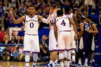 LAWRENCE, KS - FEBRUARY 21:  Frank Mason III #0 of the Kansas Jayhawks reacts in the final minute of  play during the game against the TCU Horned Frogs at Allen Fieldhouse on February 21, 2015 in Lawrence, Kansas.  (Photo by Jamie Squire/Getty Images)