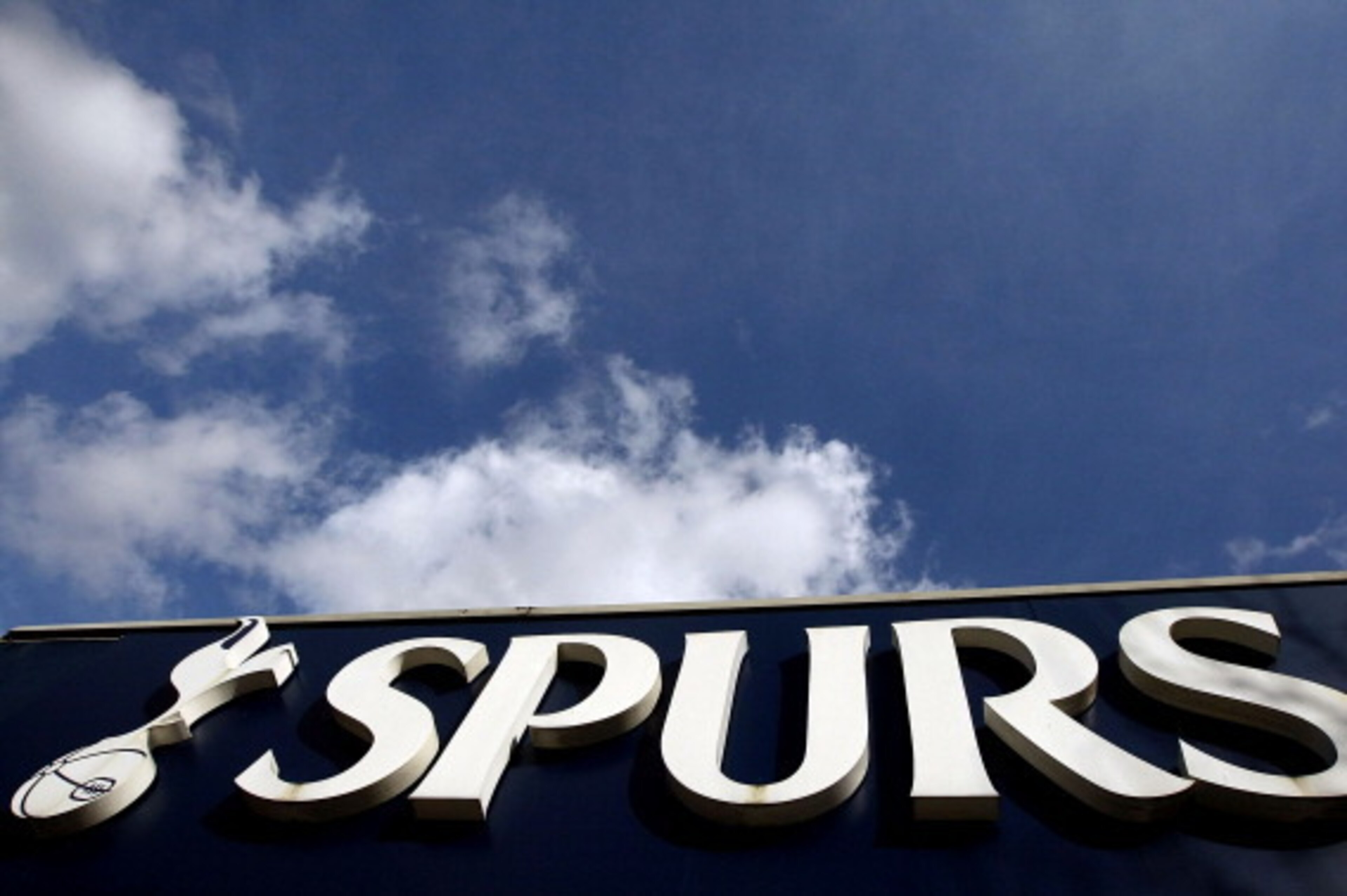 LONDON, ENGLAND - MARCH 09: A general view of  the Tottenham Hotspur Football Club logo above the club shop at White Hart Lane on March 9, 2011 in London, England. (Photo by Tom Dulat/Getty Images)