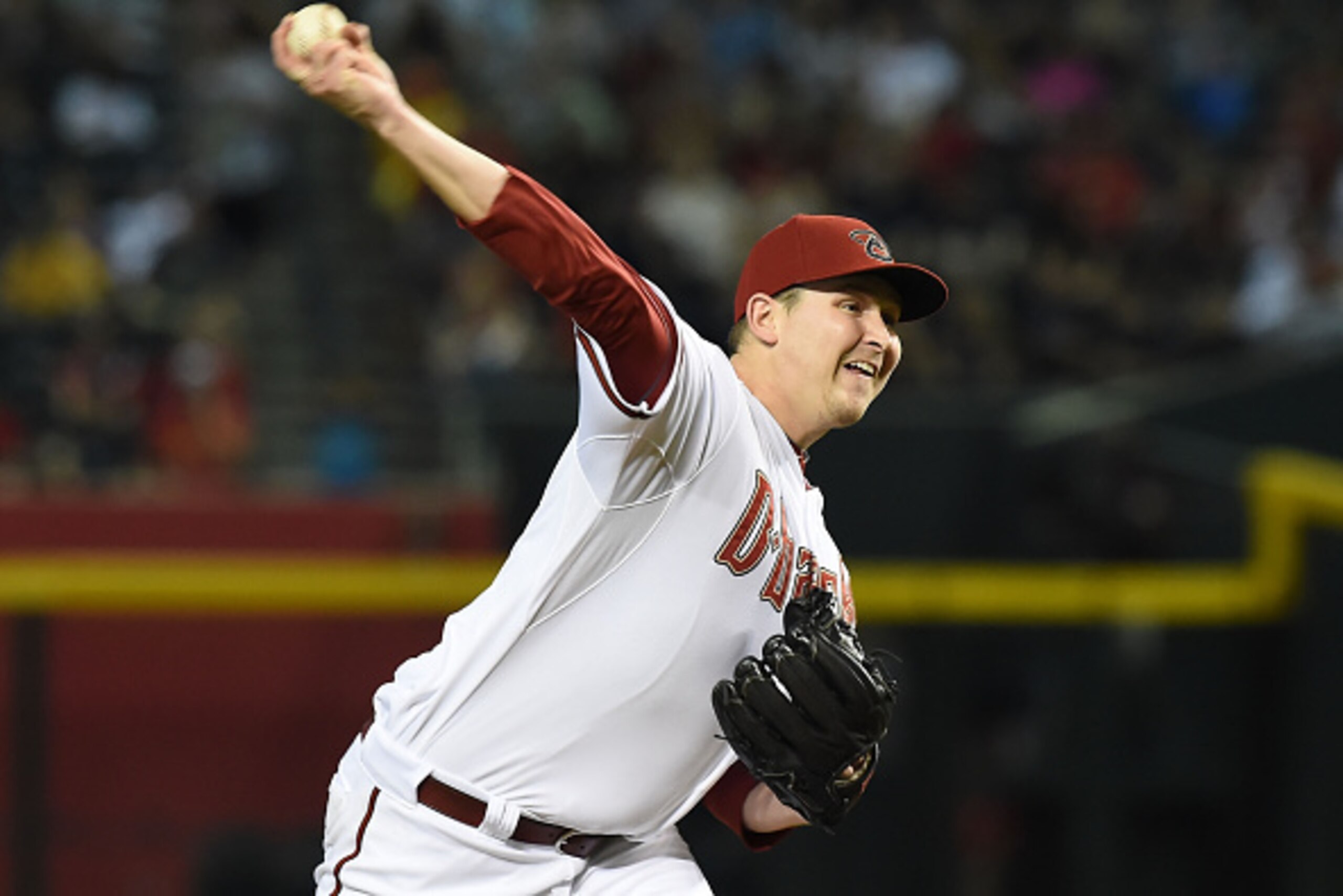 PHOENIX, AZ - SEPTEMBER 26:  Trevor Cahill #35 of the Arizona Diamondbacks delivers a first inning pitch against the St Louis Cardinals at Chase Field on September 26, 2014 in Phoenix, Arizona.  (Photo by Norm Hall/Getty Images)