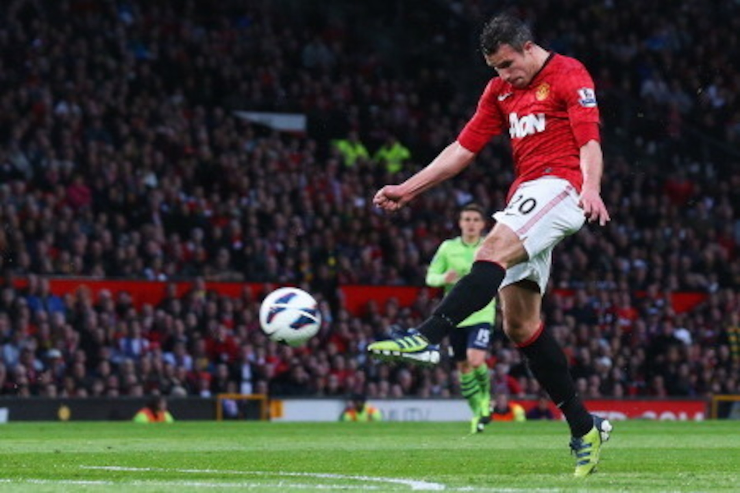 MANCHESTER, ENGLAND - APRIL 22:  Robin van Persie of Manchester United scores his team's second goal during the Barclays Premier League match between Manchester United and Aston Villa at Old Trafford on April 22, 2013 in Manchester, England.  (Photo by Al