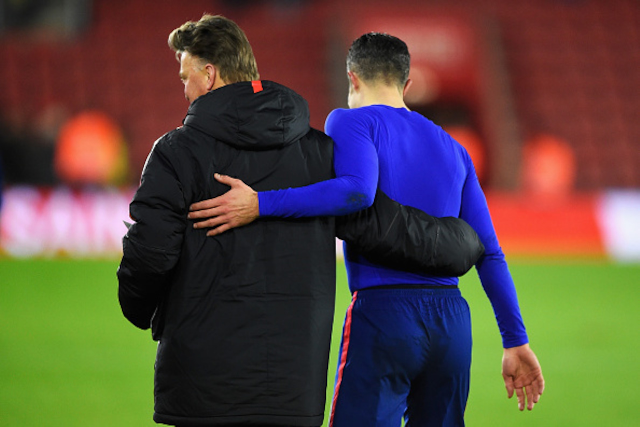 SOUTHAMPTON, ENGLAND - DECEMBER 08:  Louis van Gaal, manager of Manchester United hugs Robin van Persie of Manchester United after the Barclays Premier League match between Southampton and Manchester United at St Mary's Stadium on December 8, 2014 in Sout