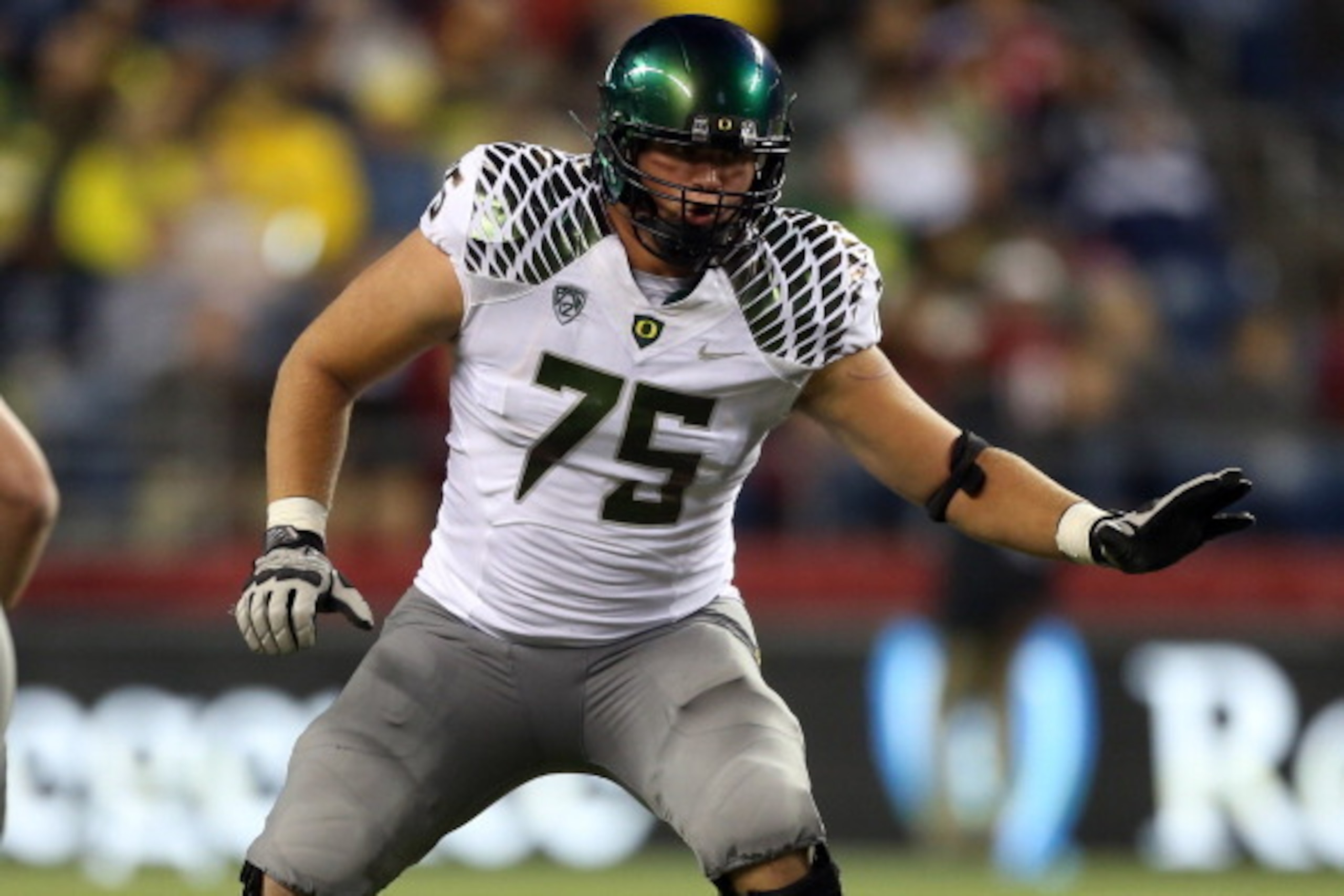 SEATTLE, WA - SEPTEMBER 29:  Jake Fisher #75 of the Oregon Ducks pass blocks against the Washington State Cougars on September 29, 2012 at CenturyLink Field in Seattle, Washington.  (Photo by Otto Greule Jr/Getty Images)