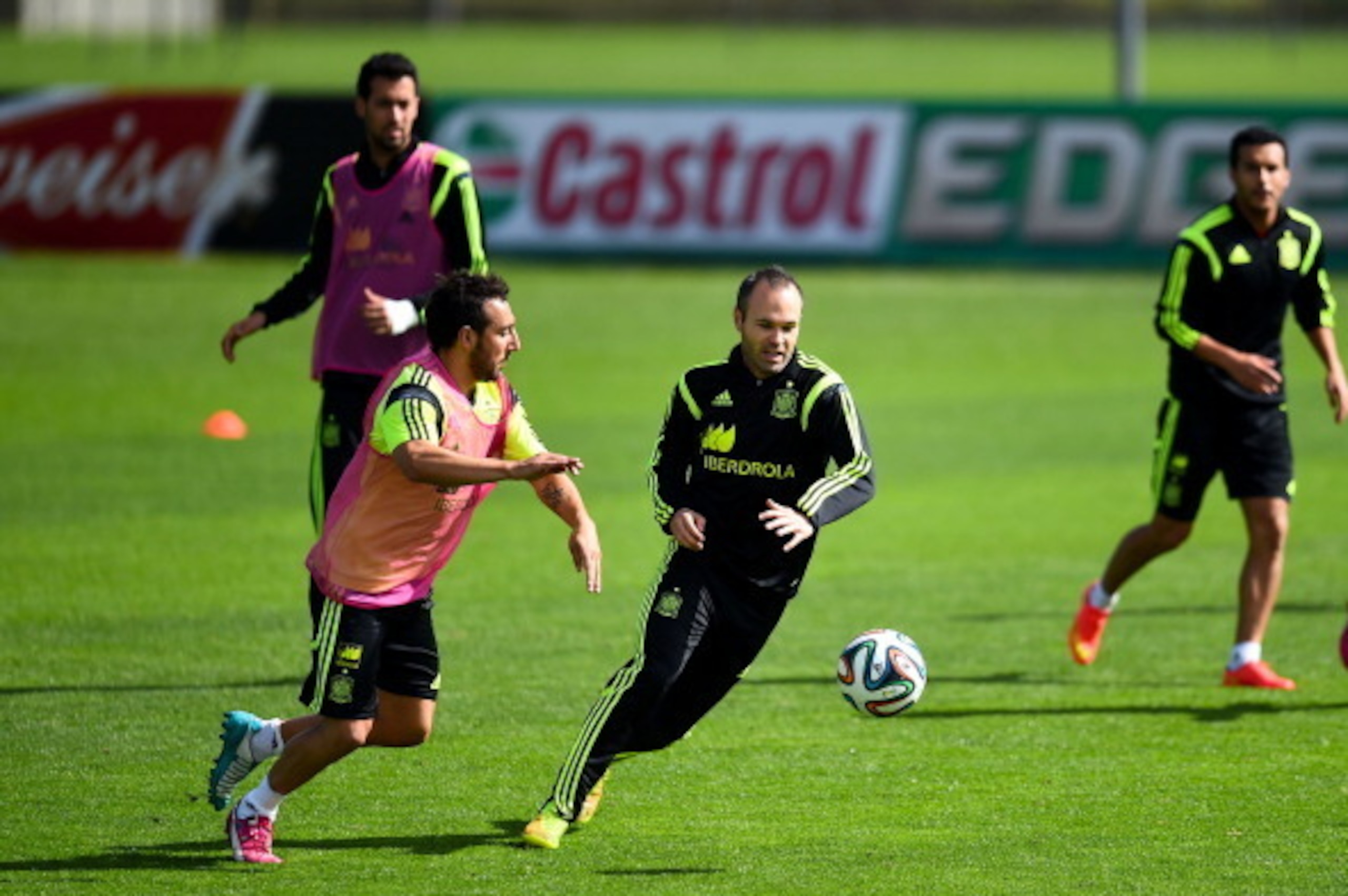 CURITIBA, BRAZIL - JUNE 21:  Santi Cazorla and Andres Iniesta of Spain in action during a Spain training session at Centro de Entrenamiento do Caju on June 21, 2014 in Curitiba, Brazil.  (Photo by David Ramos/Getty Images)