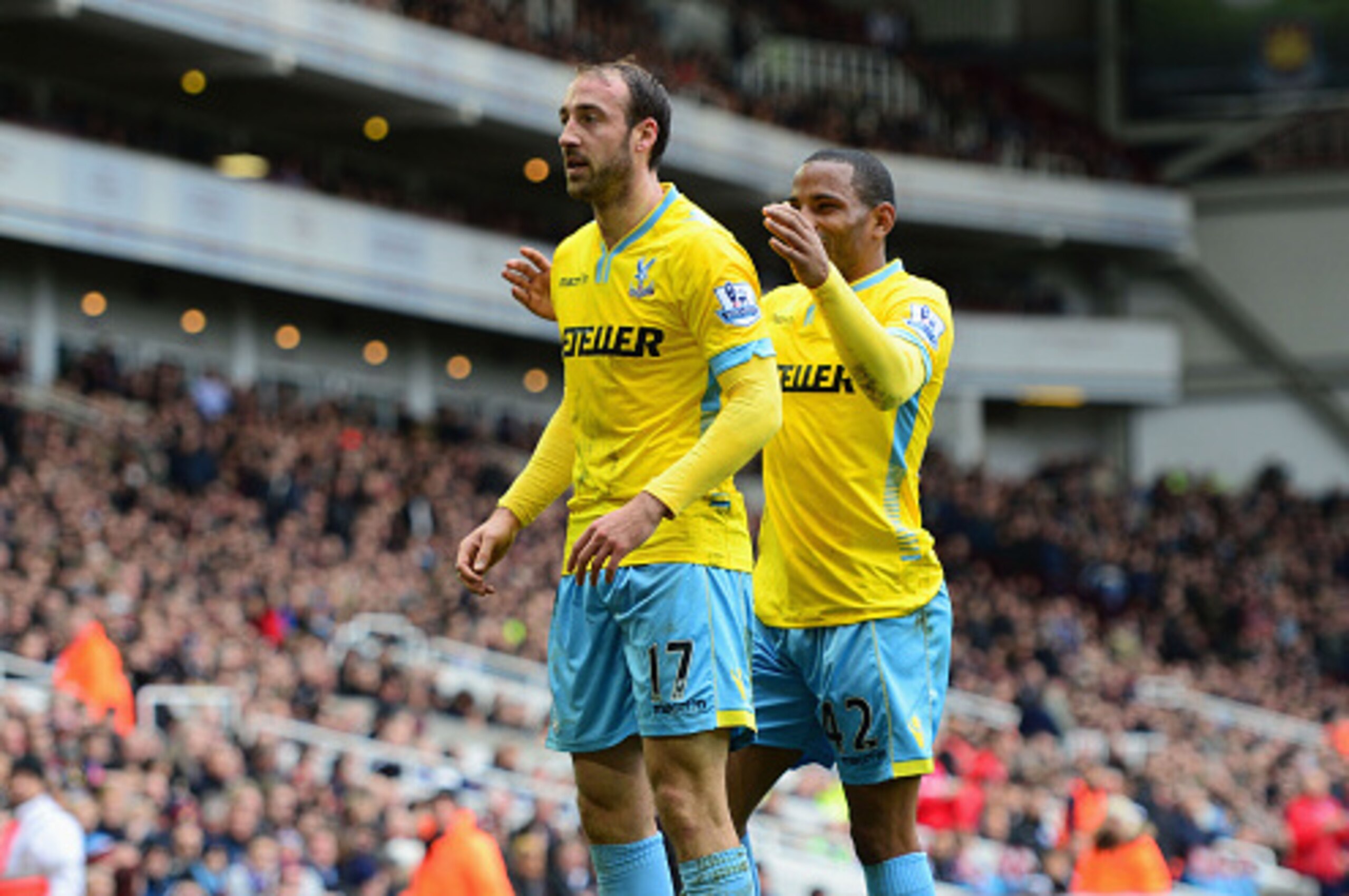 LONDON, ENGLAND - FEBRUARY 28:  Glenn Murray of Crystal Palace (17) celebrates with team mate Jason Puncheon as he scores their first goal during the Barclays Premier League match between West Ham United and Crystal Palace at Boleyn Ground on February 28,