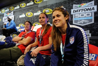 DAYTONA BEACH, FL - FEBRUARY 22:  (L-R) United States womens national soccer team members Abby Wambach, Christie Rampone and Kelley OÂHara attend the driver meeting during the NASCAR Sprint Cup Series 57th Annual Daytona 500 at Daytona International Speed