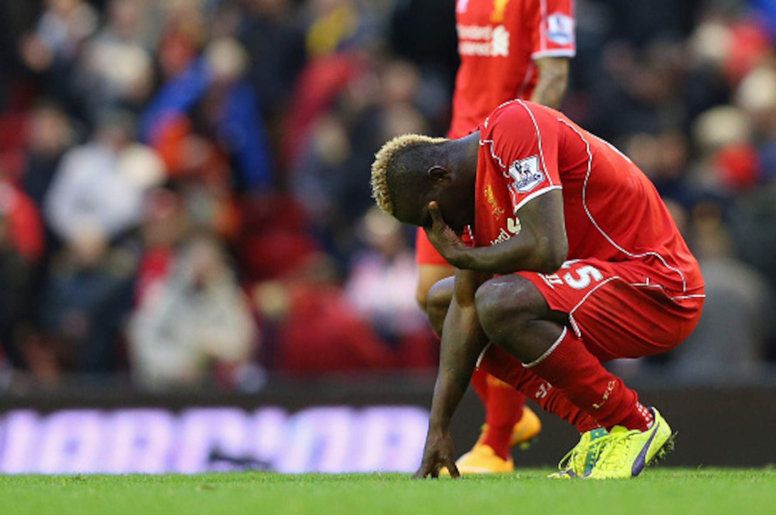 LIVERPOOL, ENGLAND - OCTOBER 25:  Mario Balotelli of Liverpool looks dejected after the Barclays Premier League match between Liverpool and Hull City at Anfield on October 25, 2014 in Liverpool, England.  (Photo by Alex Livesey/Getty Images)