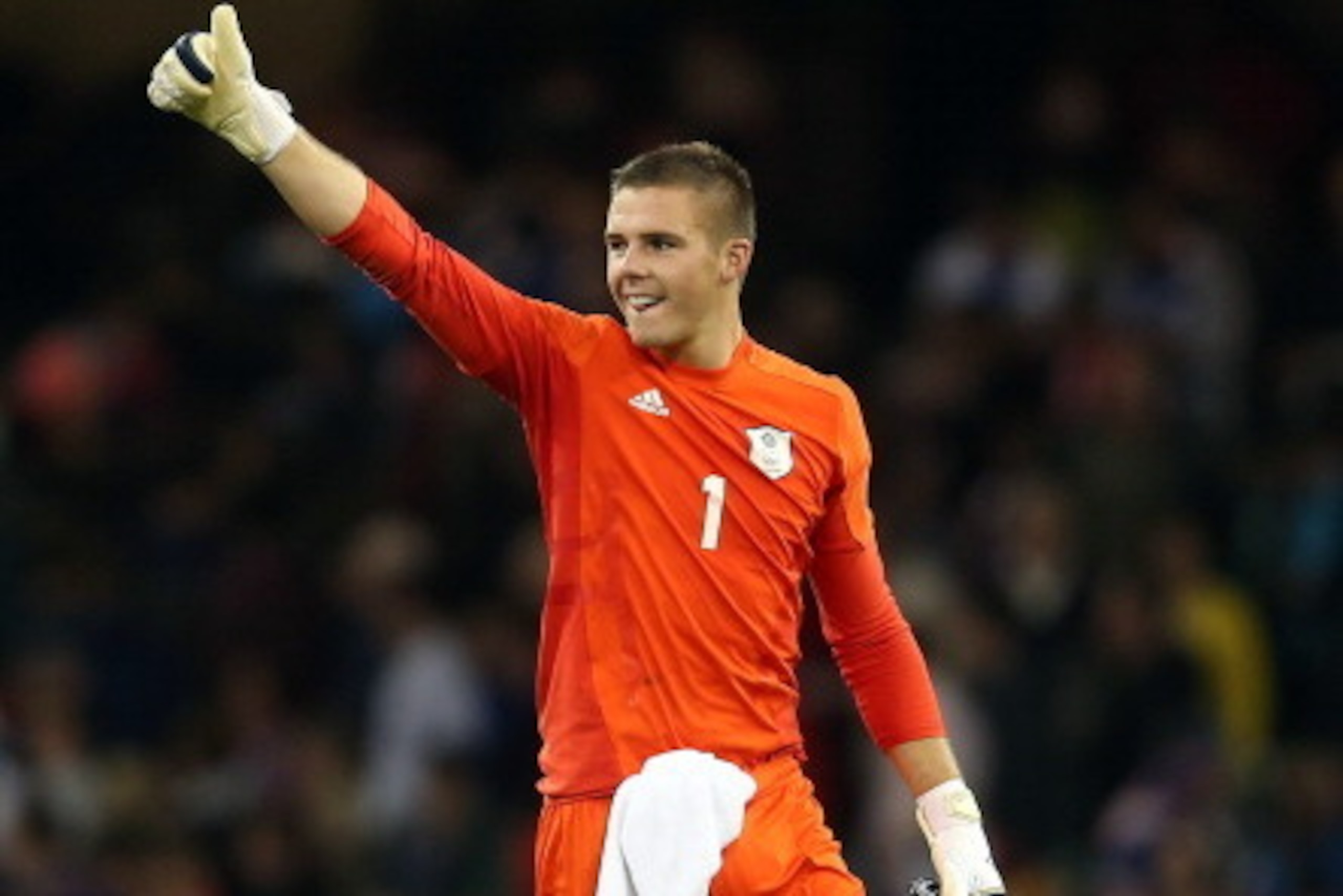 CARDIFF, WALES - AUGUST 01:  Jack Butland of Great Britain thanks the support after the Men's Football first round Group A match between Great Britain and Uruguay on Day 5 of the London 2012 Olympic Games at Millennium Stadium on August 1, 2012 in Cardiff