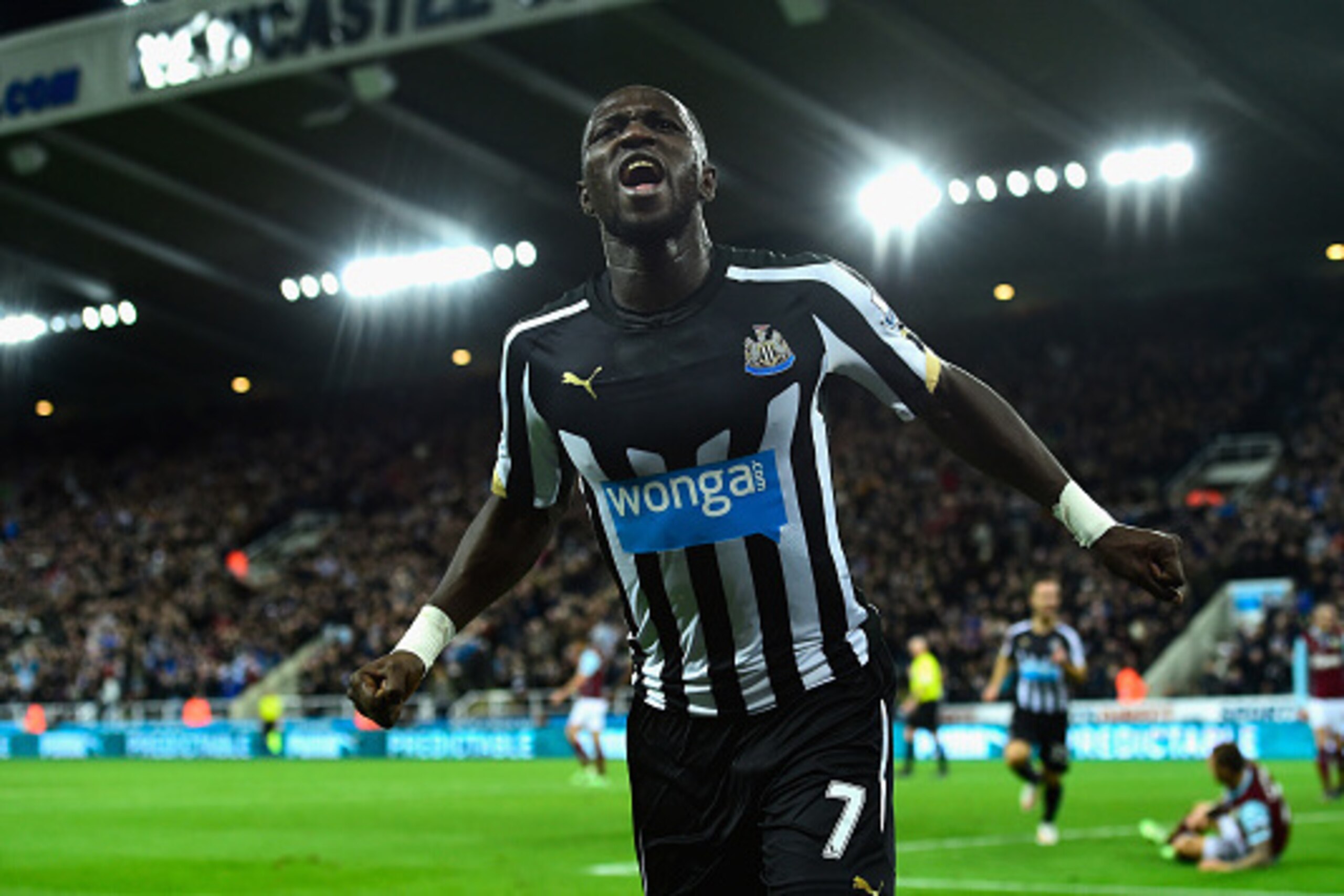 NEWCASTLE UPON TYNE, ENGLAND - JANUARY 01:  Newcastle United player Moussa Sissoko celebrates after scoring their third goal during the Barclays Premier League match between Newcastle United and Burnley at St James' Park on January 1, 2015 in Newcastle up