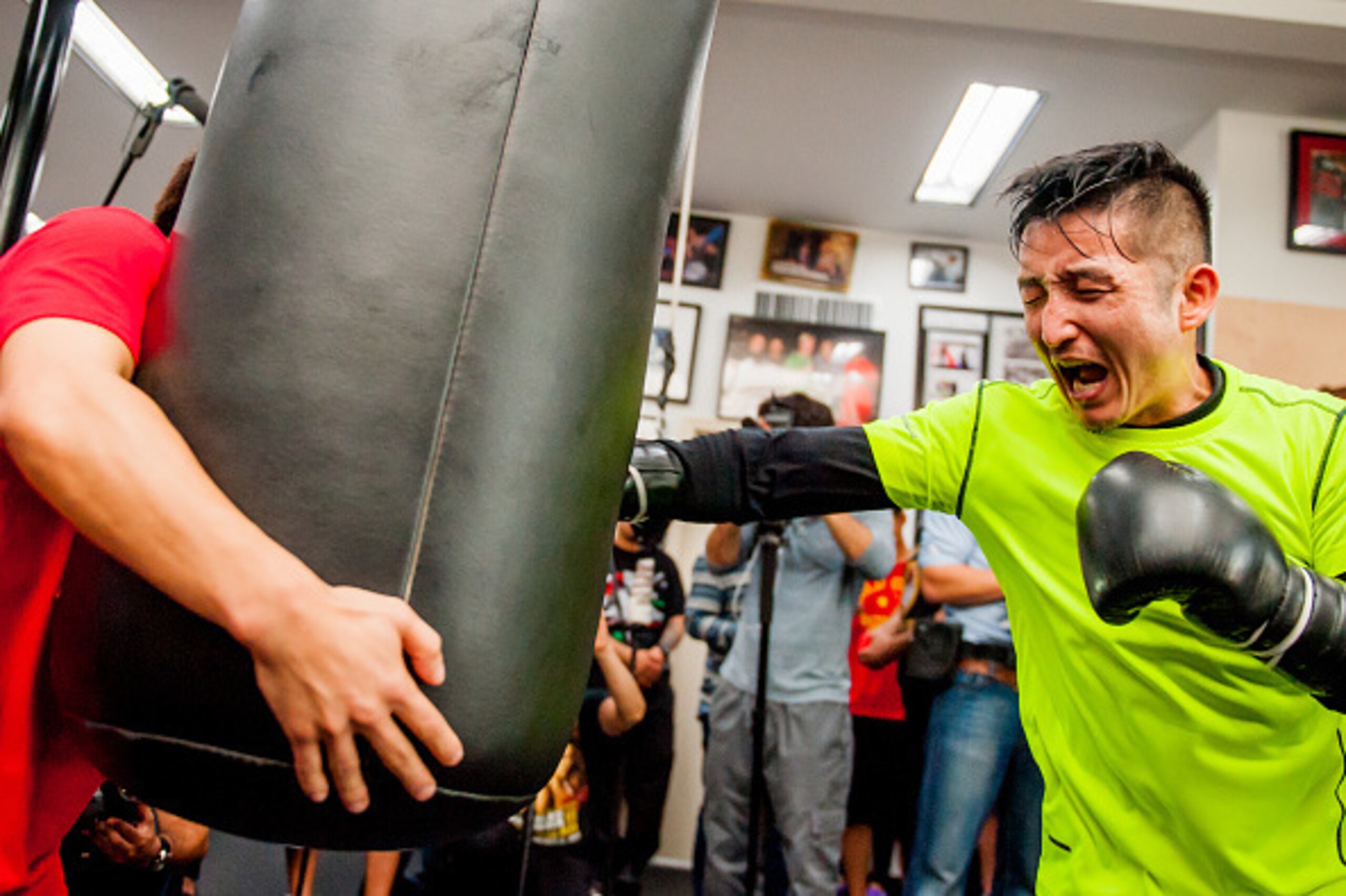 HOLLYWOOD, CA - FEBRUARY 17:  Boxer Zou Shiming of China works out with a trainer during a media workout session at Wild Card Boxing Club on February 17, 2015 in Hollywood, California.  (Photo by Jonathan Moore/Getty Images)