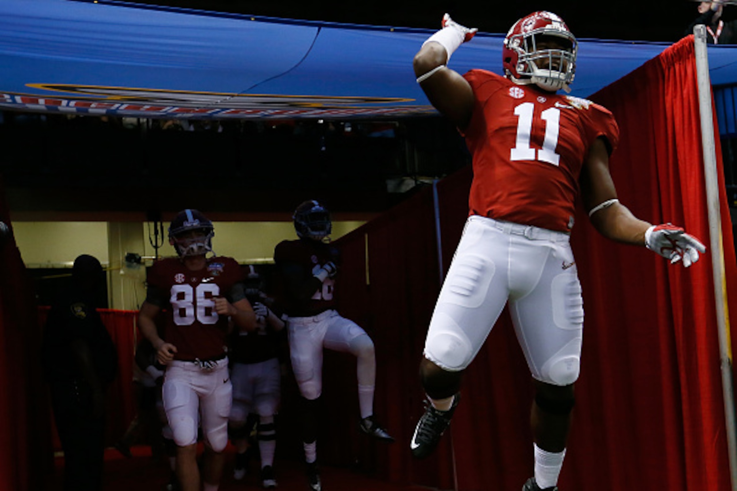 NEW ORLEANS, LA - JANUARY 01:  Shaun Dion Hamilton #11 of the Alabama Crimson Tide gets ready to run on the field prior to the All State Sugar Bowl against the Ohio State Buckeyes at the Mercedes-Benz Superdome on January 1, 2015 in New Orleans, Louisiana