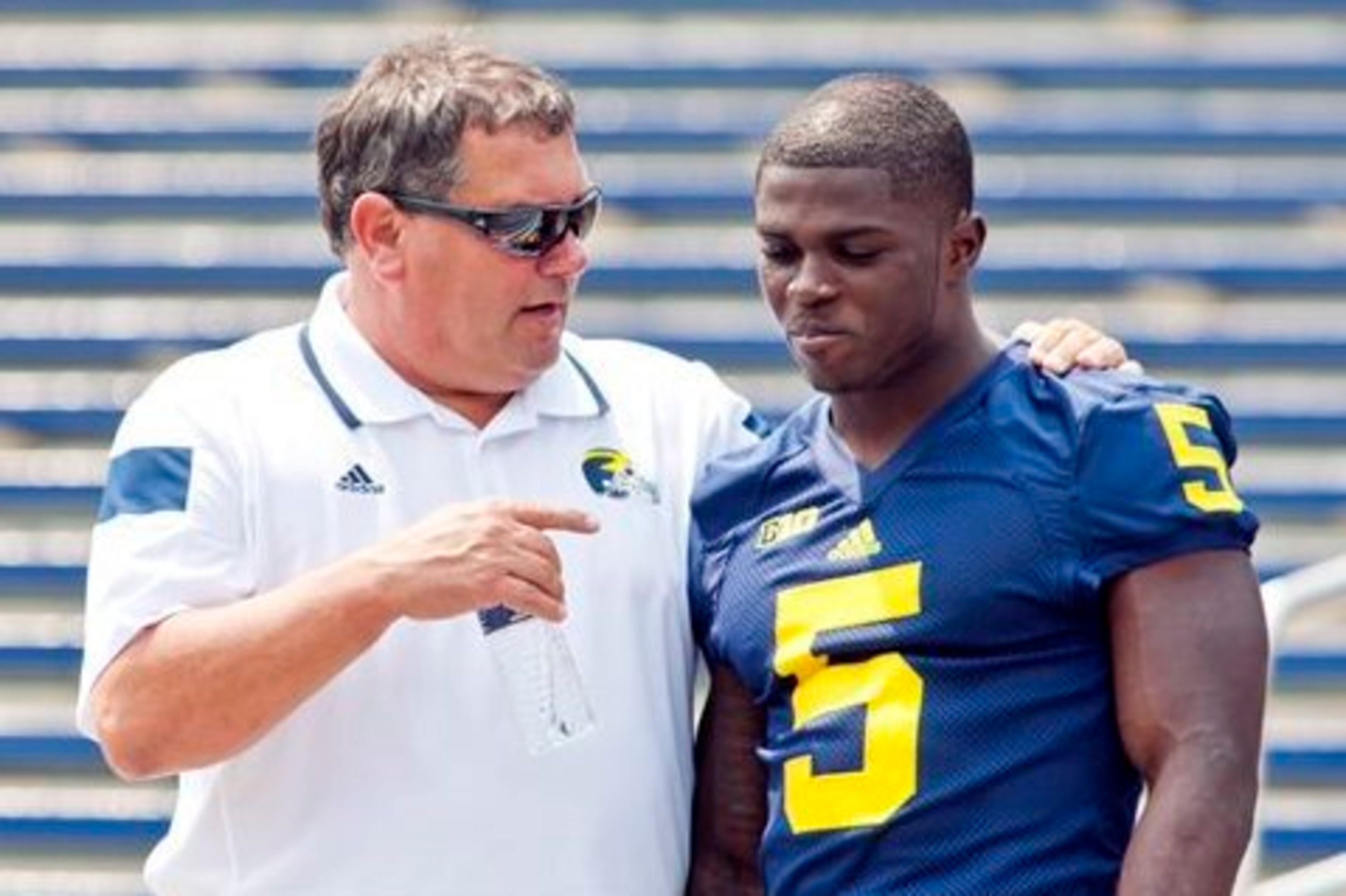 Jabrill Peppers with former Michigan coach Brady Hoke prior to the start of the 2014 season.