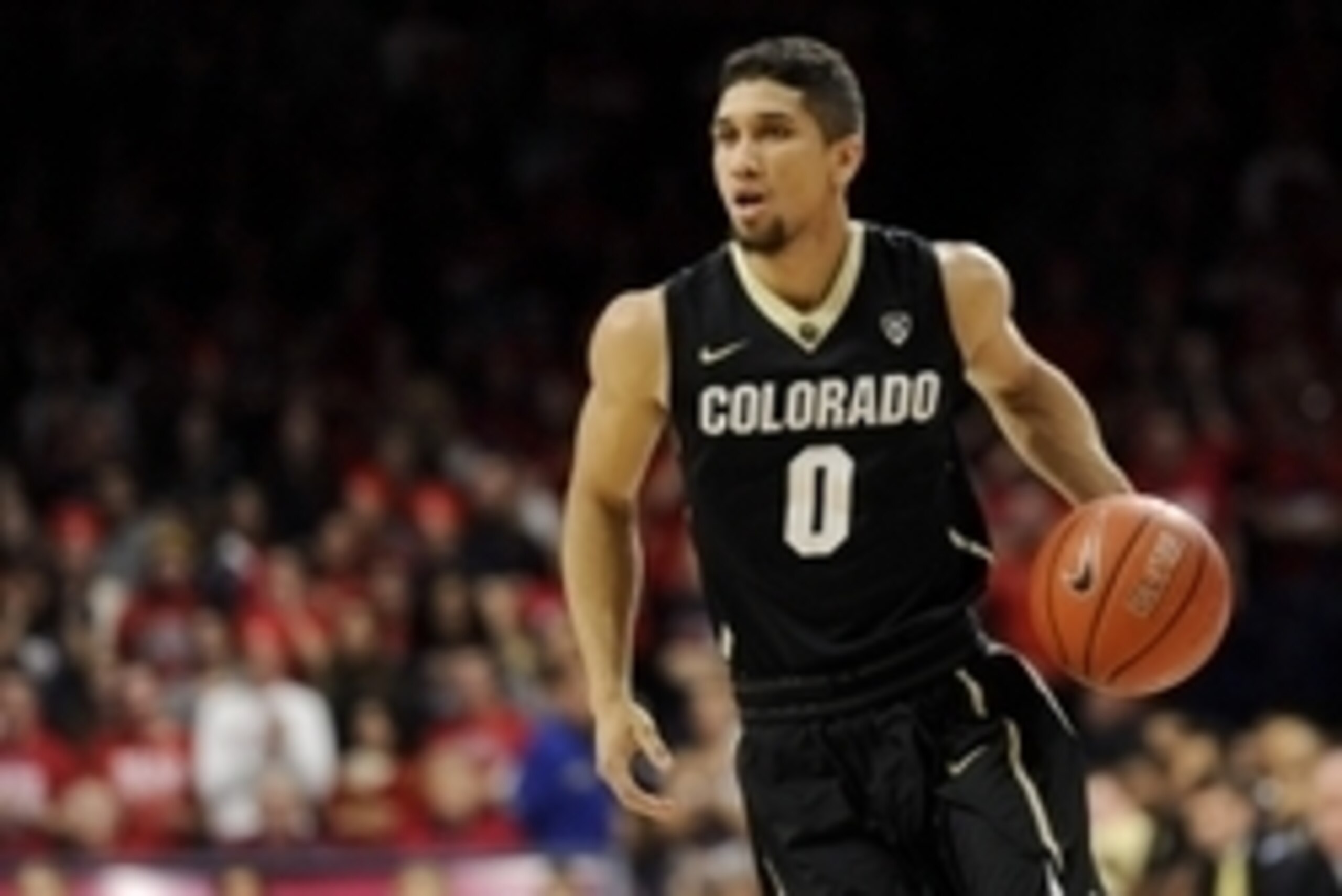 Jan 15, 2015; Tucson, AZ, USA; Colorado Buffaloes guard Askia Booker (0) dribbles the ball during the first half against the Arizona Wildcats at McKale Center. Arizona won 68-54. Mandatory Credit: Casey Sapio-USA TODAY Sports